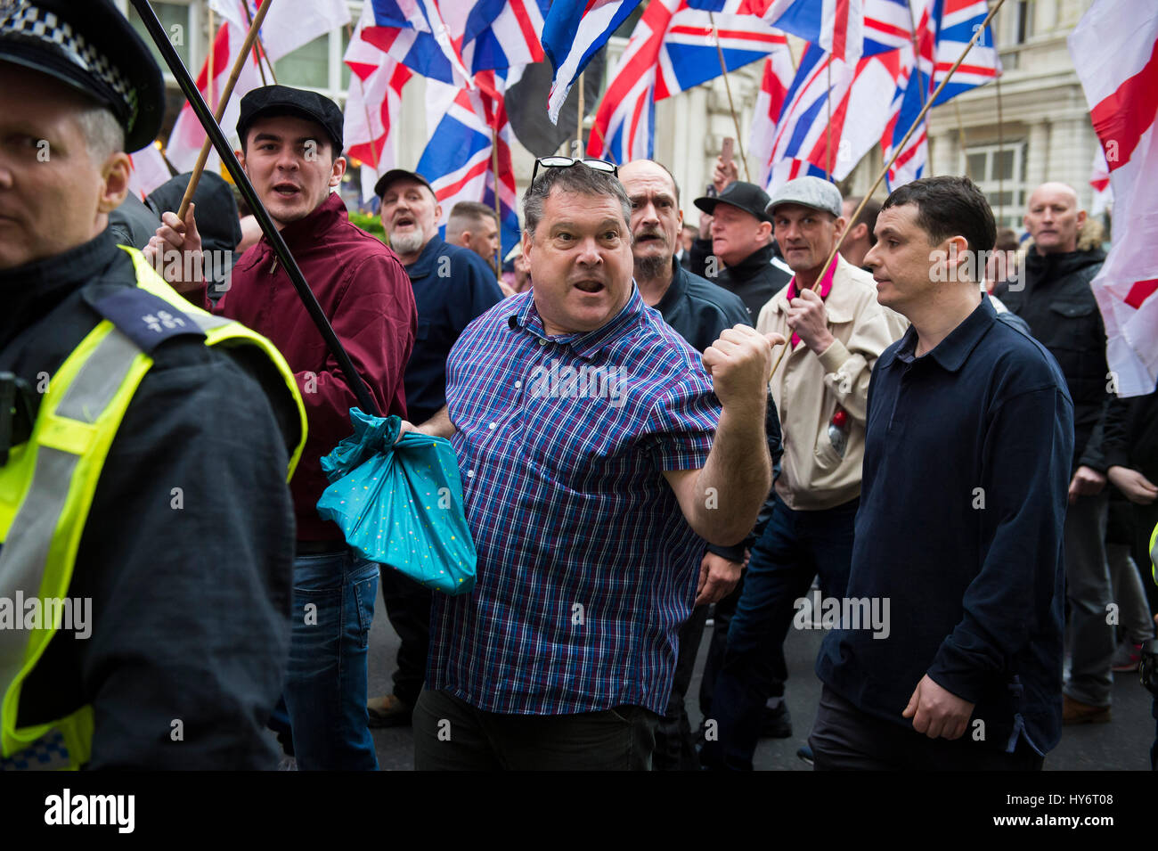 Britain First and EDL (English Defence League) protesters walk along ...