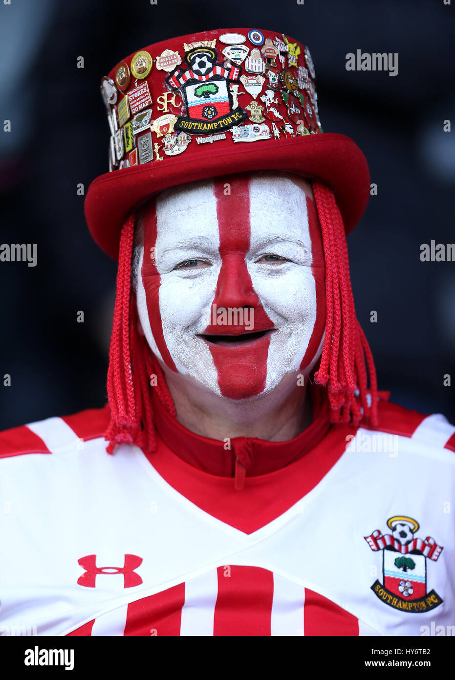 A Southampton fan with face paint during the Premier League match at St