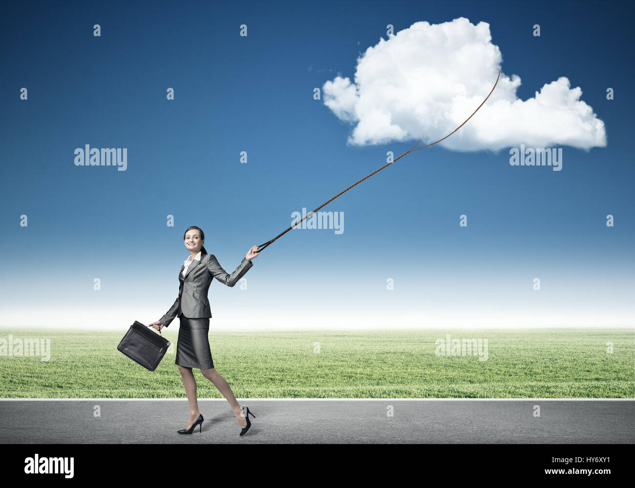 Woman catch cloud Stock Photo