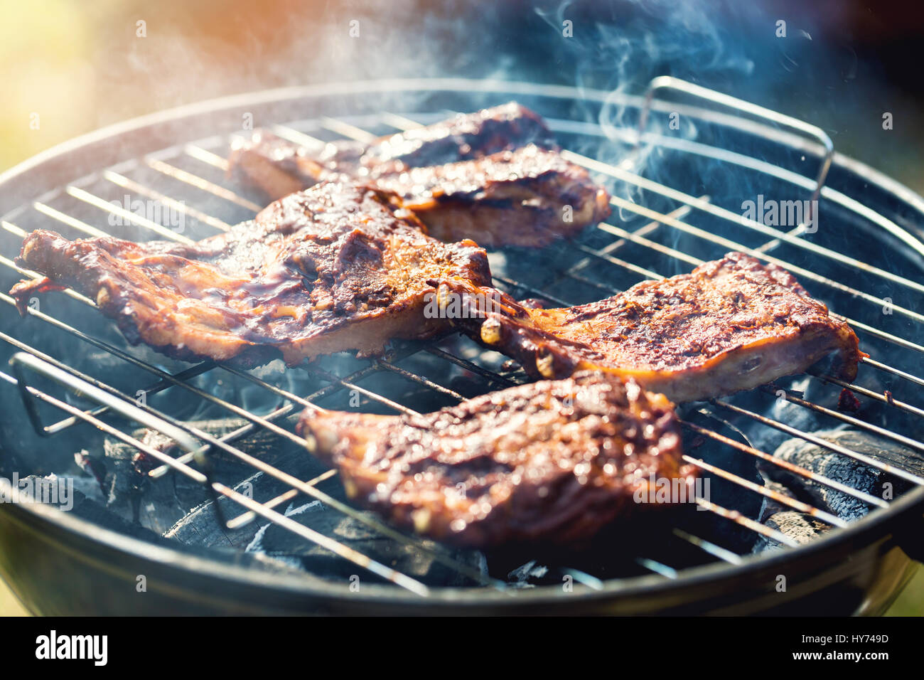 american barbecue - preparing beef ribs on charcoal grill Stock Photo