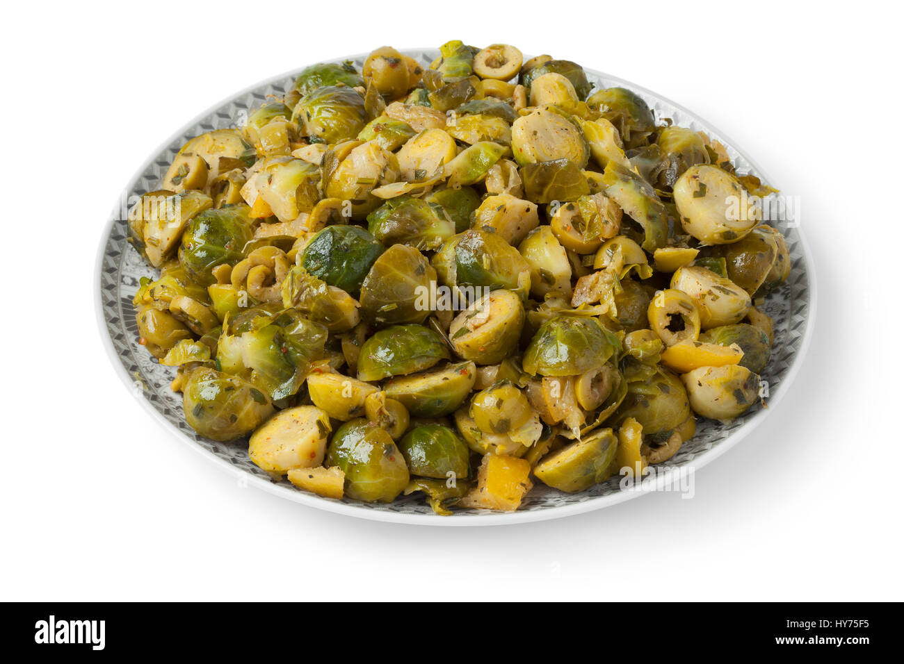 Moroccan dish with Brussels sprouts and preserved lemon on white background Stock Photo