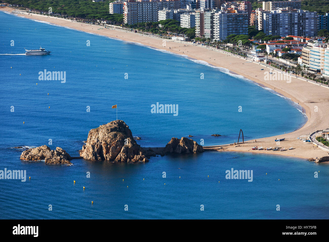 Blanes town in Spain, beach and Sa Palomera rocks at Mediterranean Sea