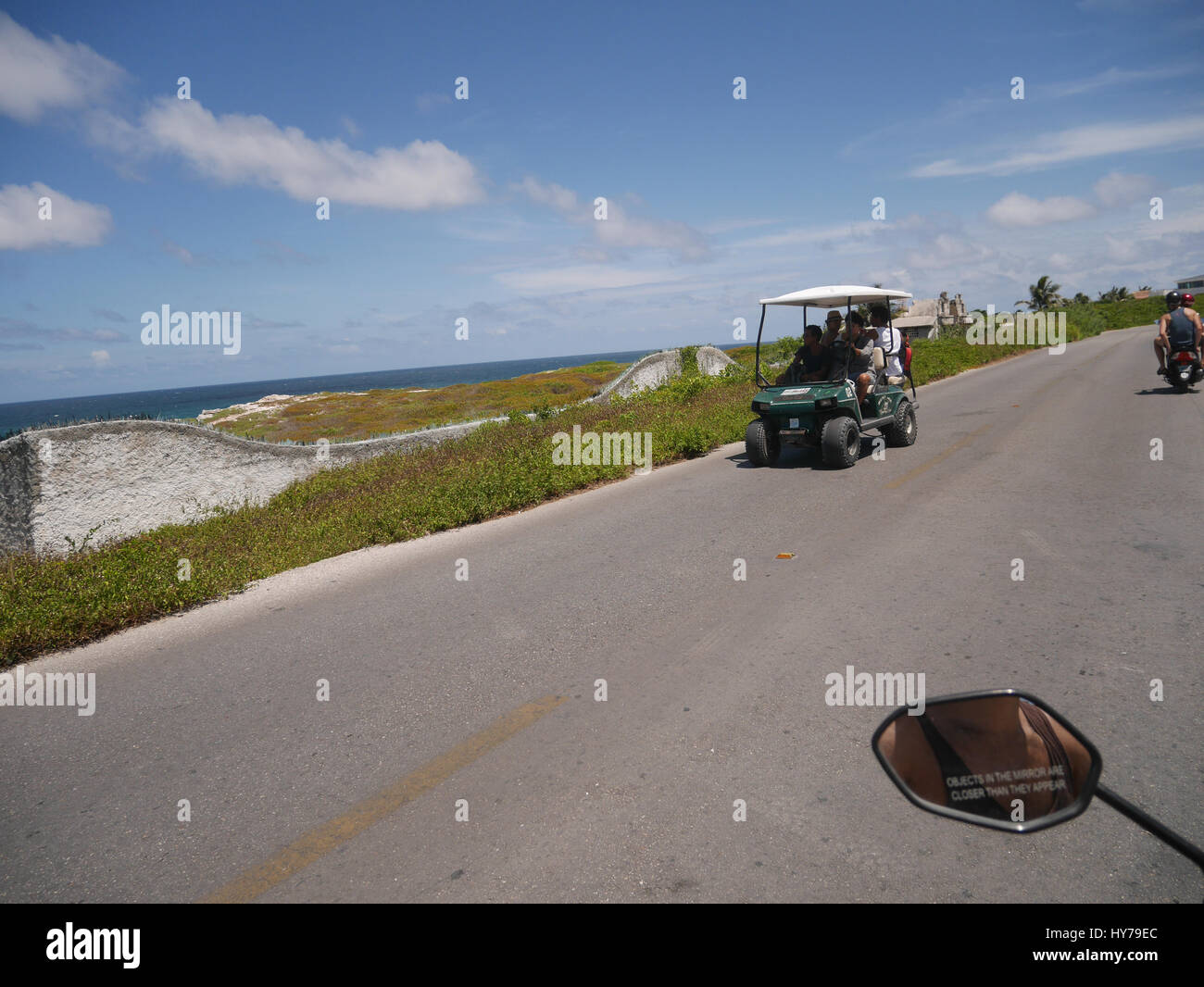 Golf carts used as main transport in Isla Mujeres here people rent and