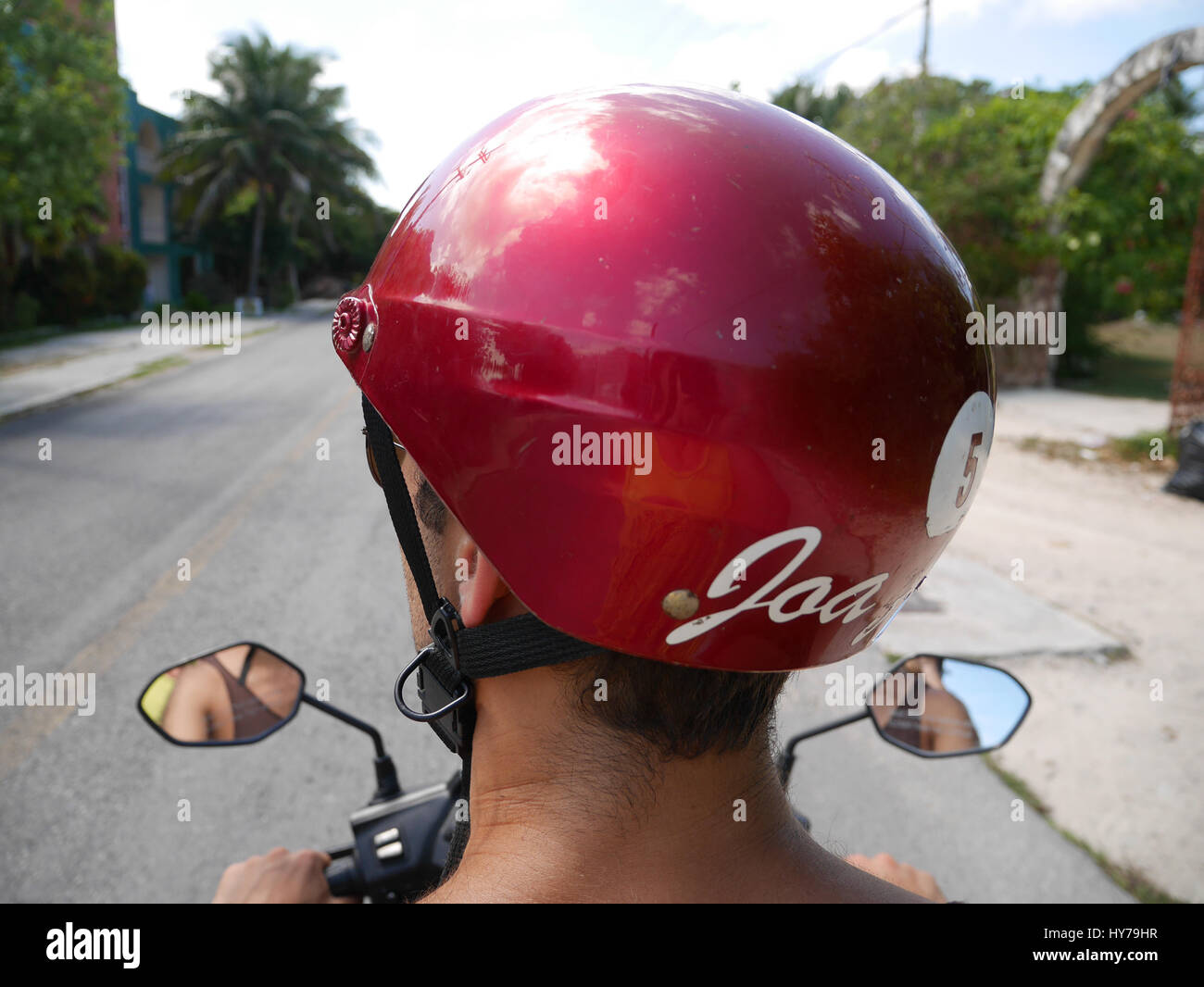 Red helmet scooter driver Stock Photo Alamy