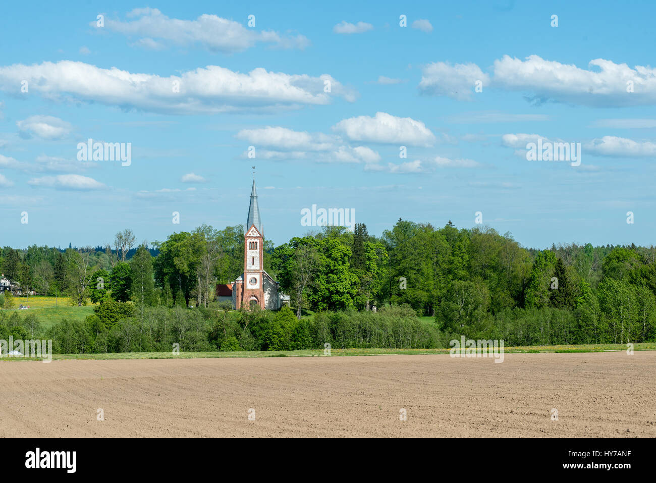 countryside church in summer in small village Stock Photo - Alamy