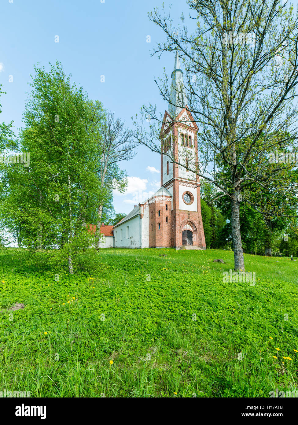 countryside church building in summer in small village Stock Photo - Alamy