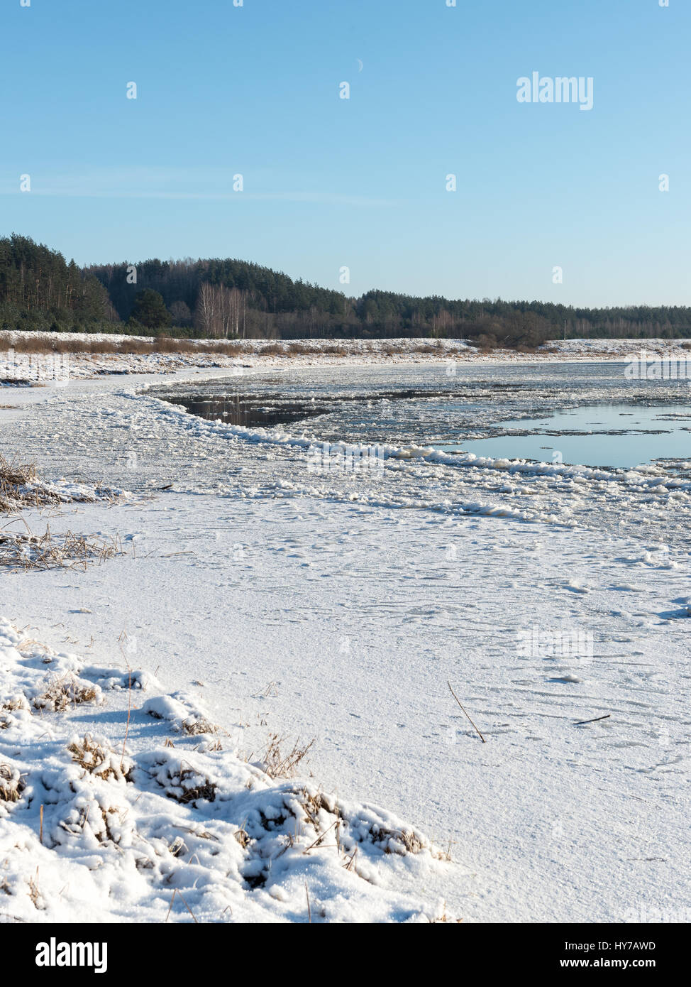 beautiful snowy winter landscape with frozen river and blue sky Stock ...