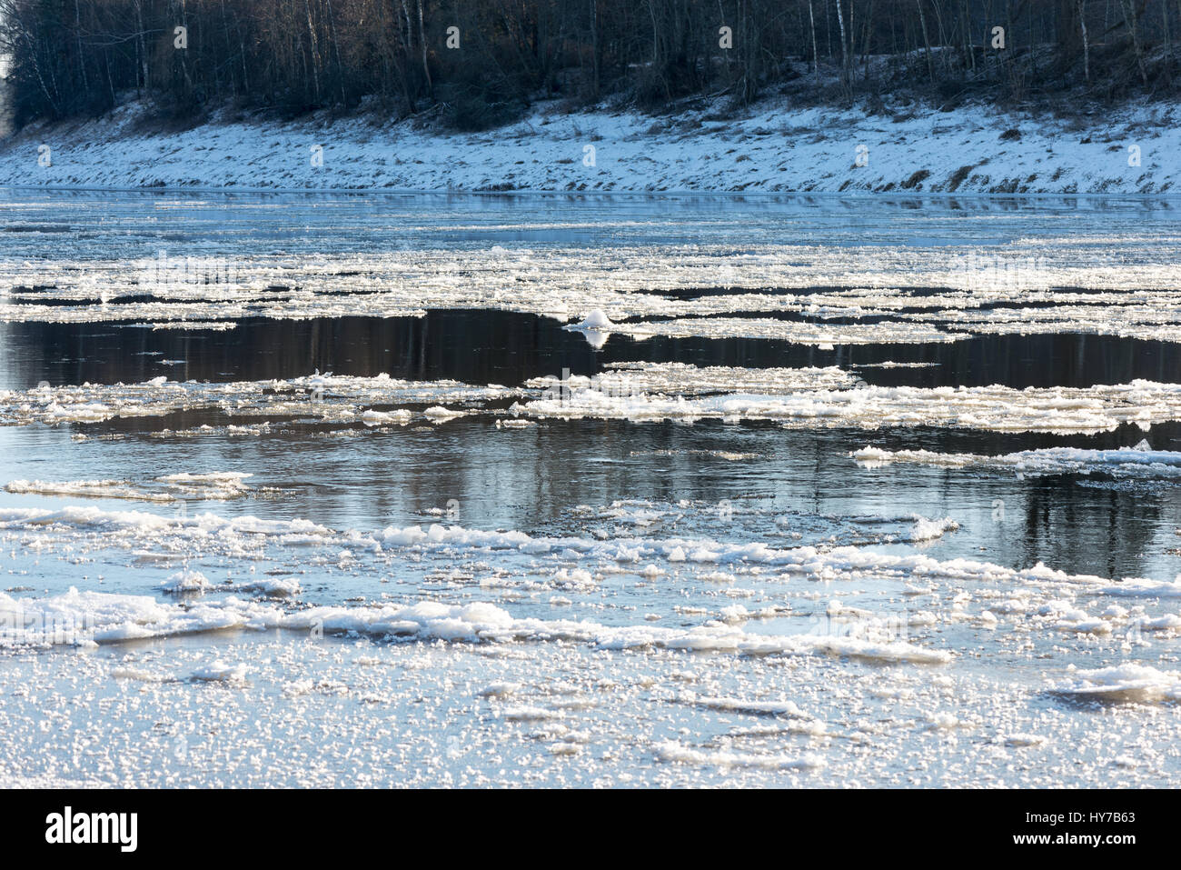 beautiful snowy winter landscape with frozen river and blue sky Stock ...