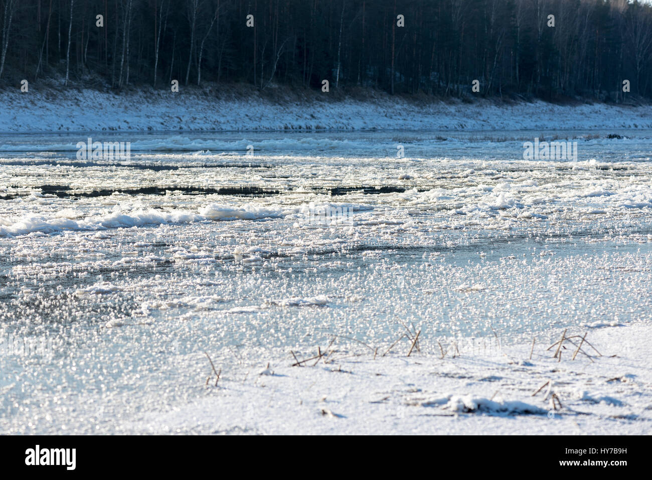 beautiful snowy winter landscape with frozen river and blue sky Stock ...