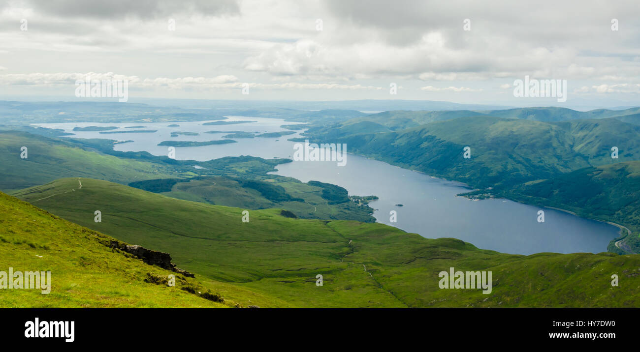View of Loch Lomond a freshwater Scottish loch from the top of Ben Lomond in a sunny day. Scotland (UK). Stock Photo