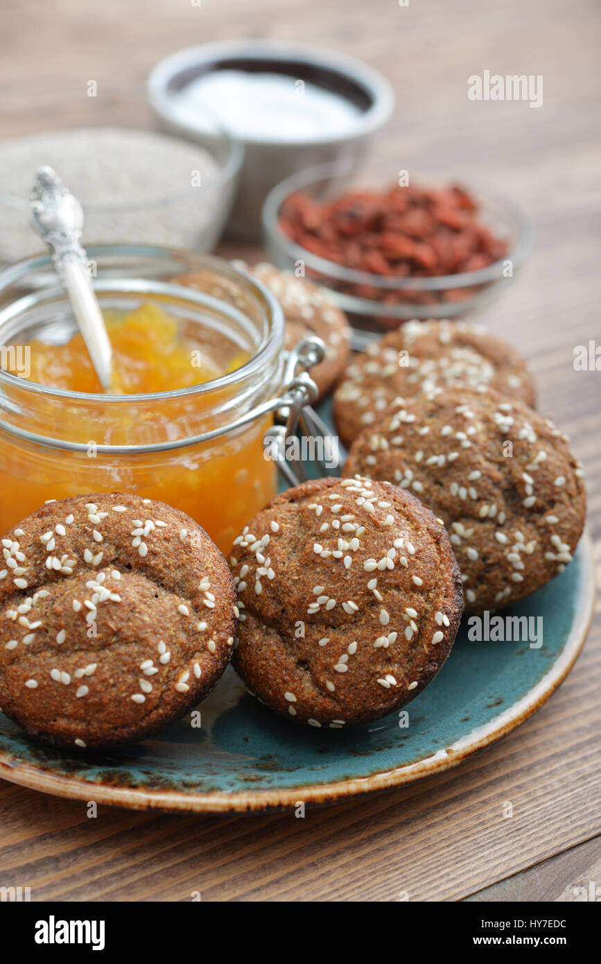 Protein muffin (without flour) with sesame and sugar free apricot jam on plate closeup Stock Photo