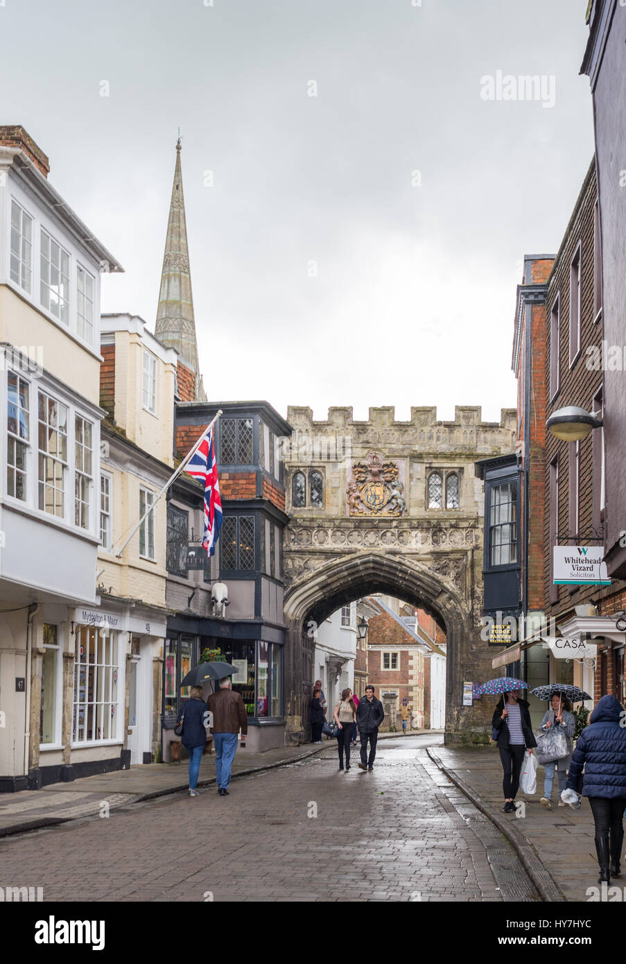 High Street Gate, Salisbury, Wiltshire, UK. Mixed weather in the historic cathedral city with heavy April rain showers and sunshine on a spring afternoon. Stock Photo