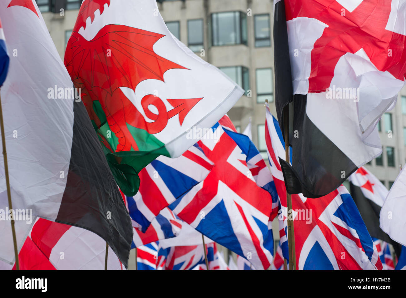 London, UK. 1st April, 2017.  The English Defence League (EDL) and Britain First held a protest march through London. The Britain First group were protesting against terrorism in response to the reason terrorist attack in London on March the 22nd 2017. Flags waved during the march. Andrew Steven Graham/Alamy Live News Stock Photo