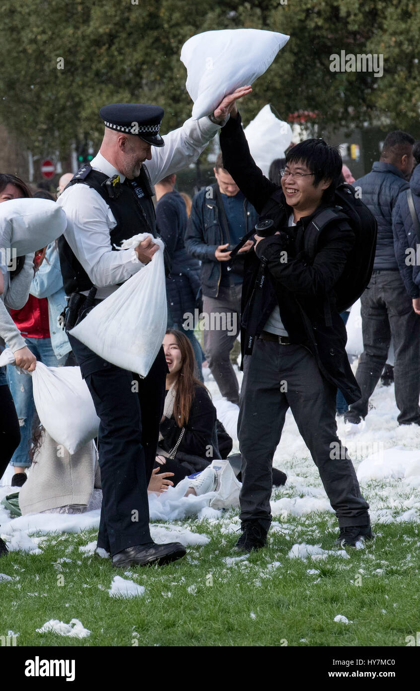 London 1st April 2017, International Pillow Fight Day, Kennington Park, London A senior police officer takes part in some community interaction Credit: Ian Davidson/Alamy Live News Stock Photo