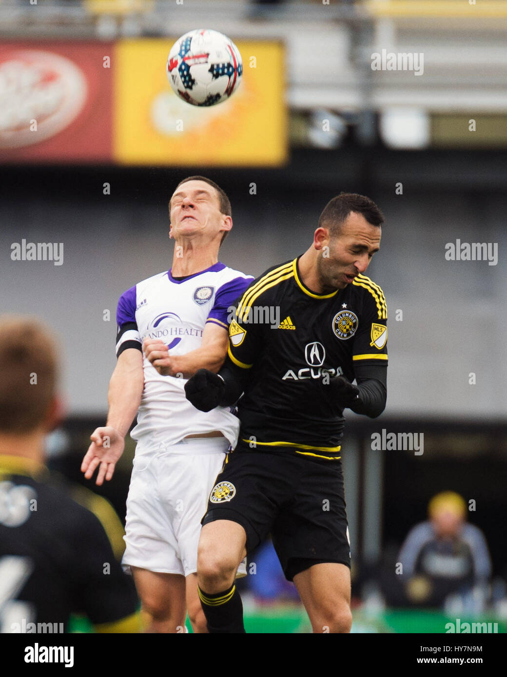 April 1, 2017: Orlando City SC defender Jonathan Spector (2) and Columbus Crew SC forward Justin Meram (9) go for the head ball in their match at Mapfre Stadium in Columbus, Ohio. Brent Clark/Alamy Stock Photo