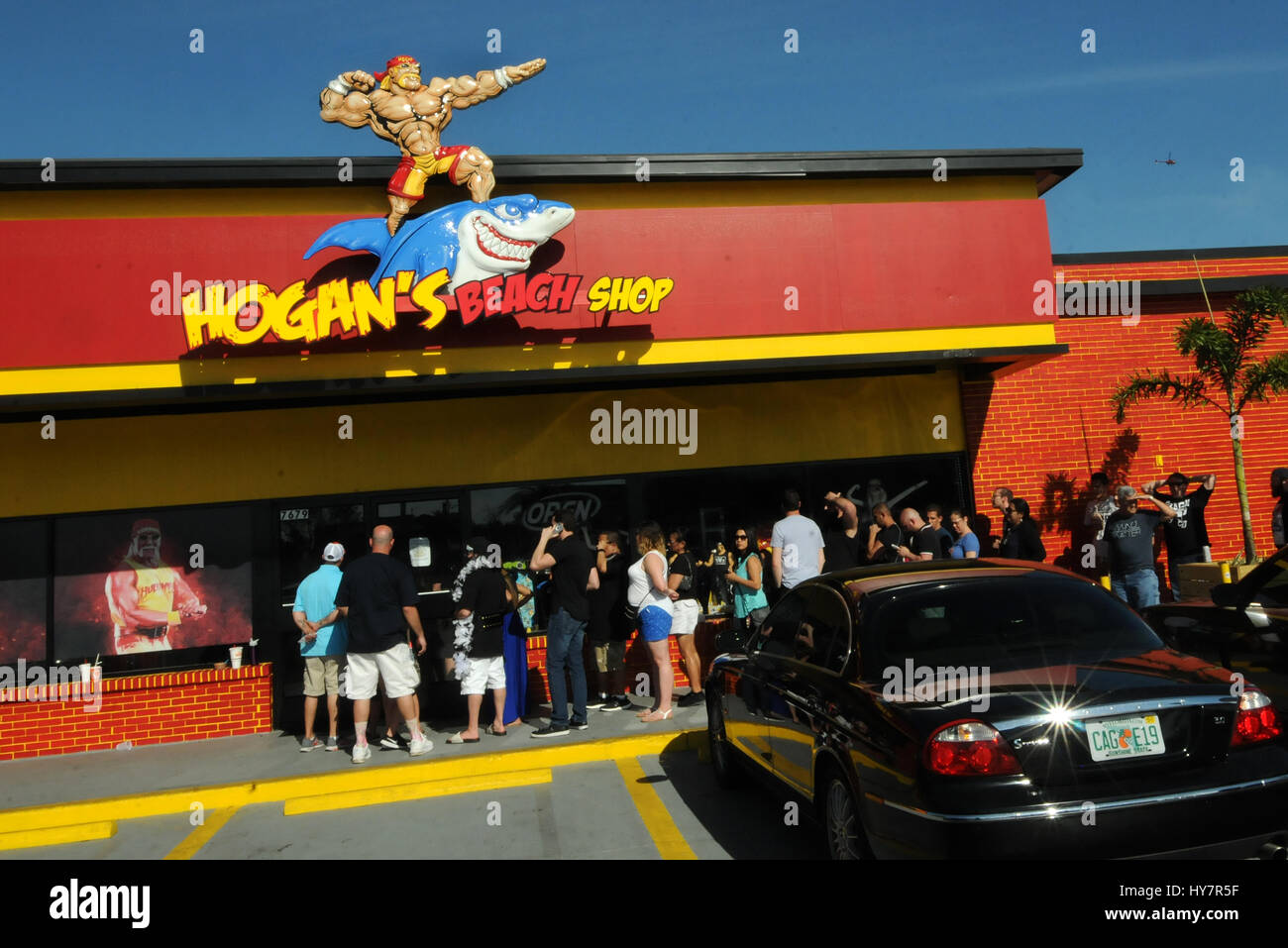 Orlando, Florida, USA. 1st April, 2017. People wait in line for autographs and photos with semi-retired professional wrestler Terry Gene Bollea, better known by his ring name Hulk Hogan, outside Hogan's Beach Shop, his retail merchandise store which opened on March 30, 2017 in Orlando, Florida. Credit: Paul Hennessy/Alamy Live News Stock Photo