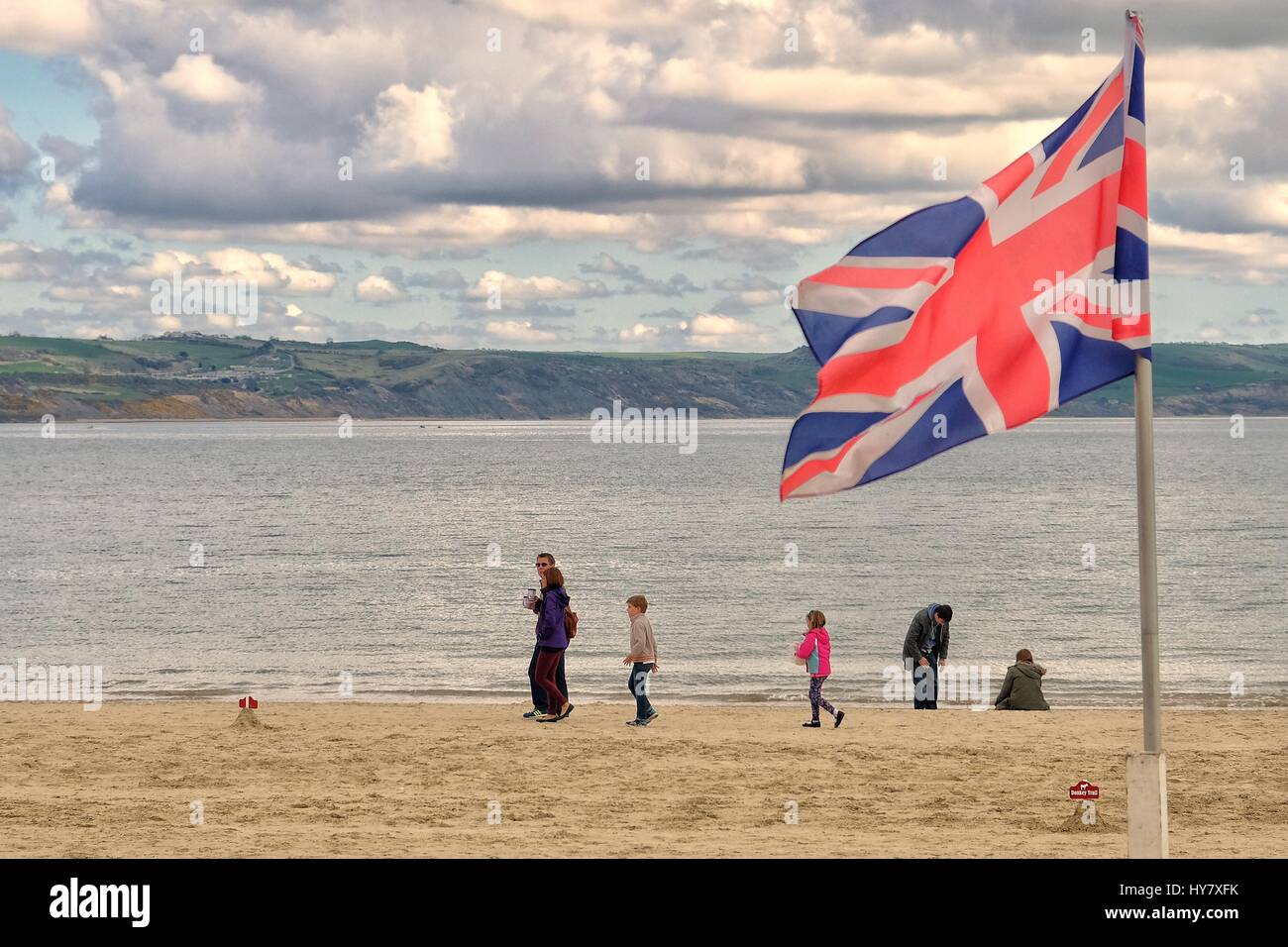 Weymouth, Dorset, UK. 2 April 2017.  Visiters enjoy the sunshine on Weymouth Beach as the temprature continues to stay above the seasonal average. Stock Photo