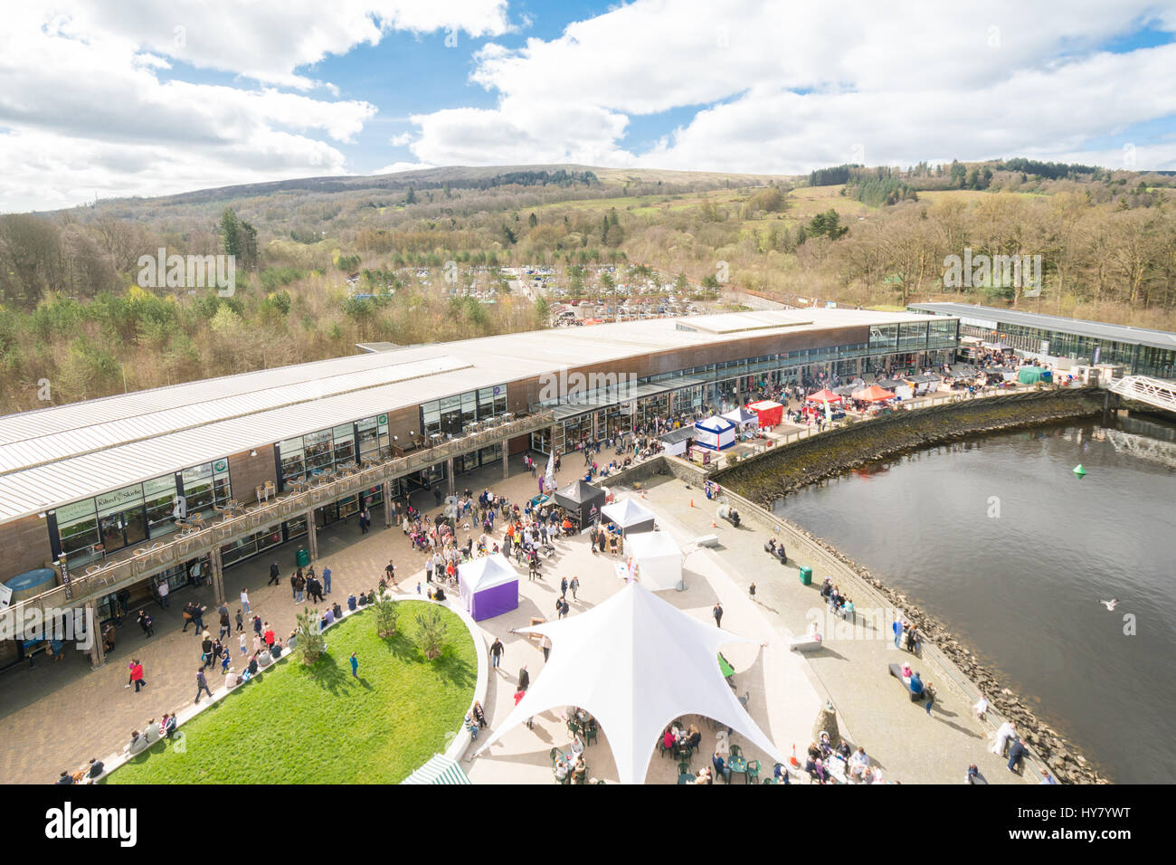 Loch Lomond Shores, Balloch, UK. 2nd Apr, 2017. UK weather - the sun shining on the Loch Lomond Shores Springfest Scottish Food Festival. After a cool cloudy morning, by lunchtime the clouds parted and crowds flocked to enjoy food and drink from a huge number of suppliers Credit: Kay Roxby/Alamy Live News Stock Photo