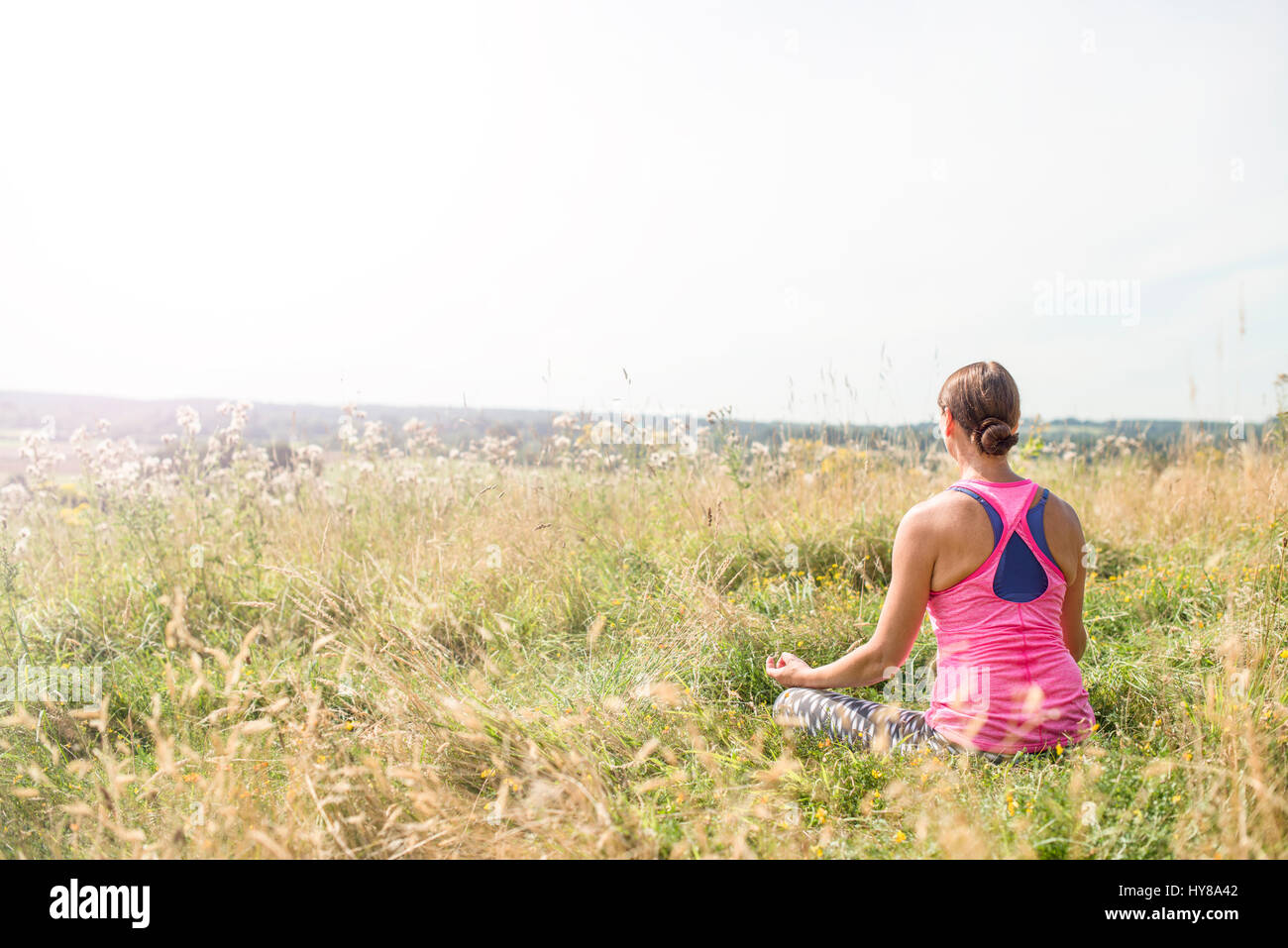 Woman outside in sunshine hi-res stock photography and images - Alamy