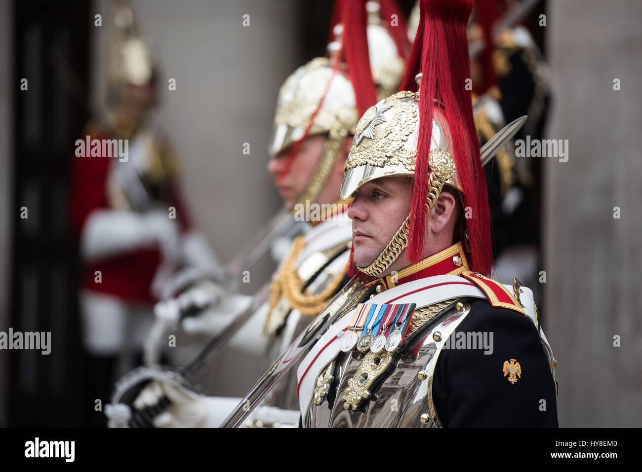 Life Guards of the Household Cavalry stand outside Whitehall during the arrival ceremony for U.S. Secretary of Defense Jim Mattis at the Ministry of Defence March 31, 2017 in London, United Kingdom. Stock Photo