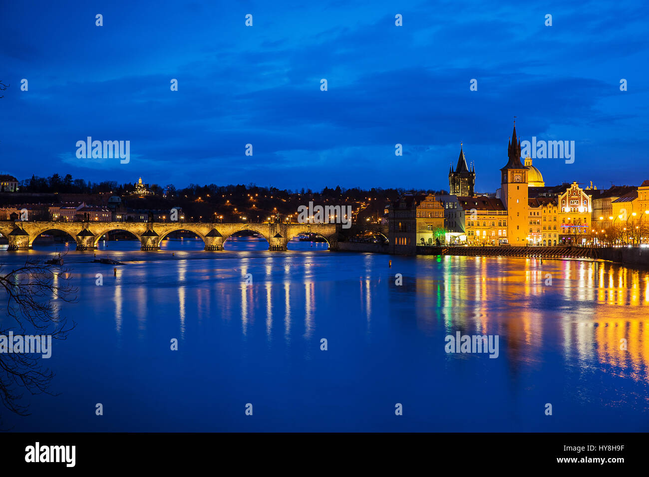 Beautiful view of the evening Charles Bridge in Prague and the Vltava River. Stock Photo
