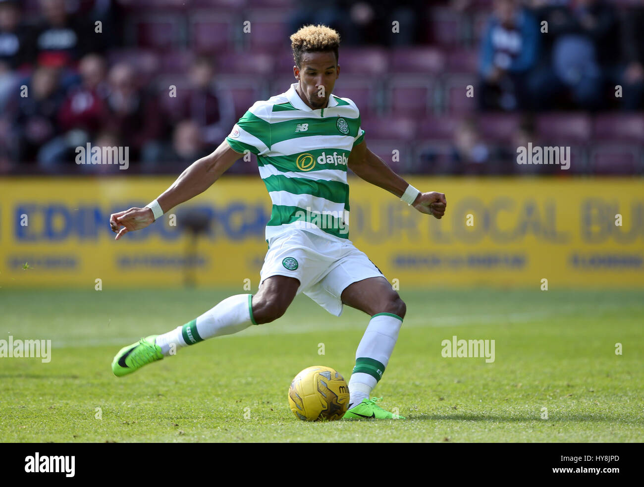 Celtic's Scott Sinclair scores his side's fifth goal of the game from the penalty spot and completes his hat-trick during the Ladbrokes Scottish Premiership match at Tynecastle Stadium, Edinburgh. Stock Photo