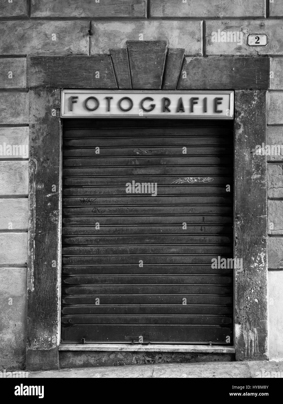 abandoned closed photography shop in italy Stock Photo