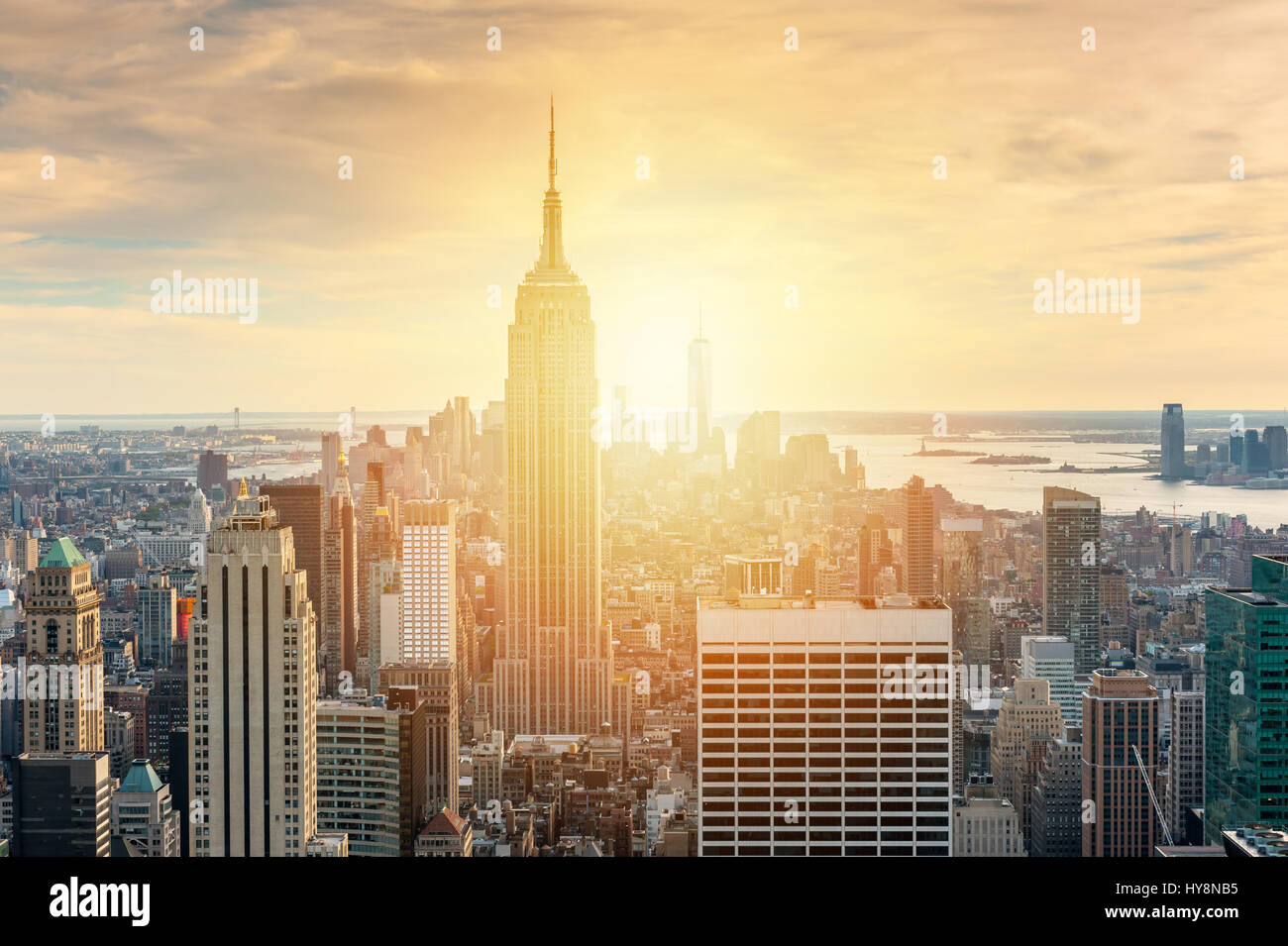 New York City skyline with urban skyscrapers at sunset Stock Photo - Alamy