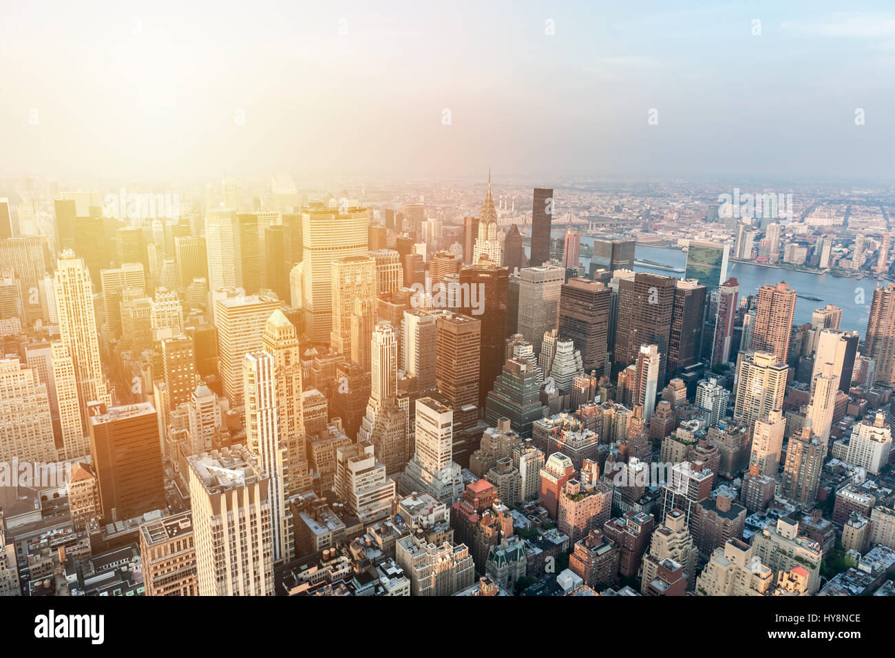 New York City skyline with urban skyscrapers at sunset Stock Photo - Alamy