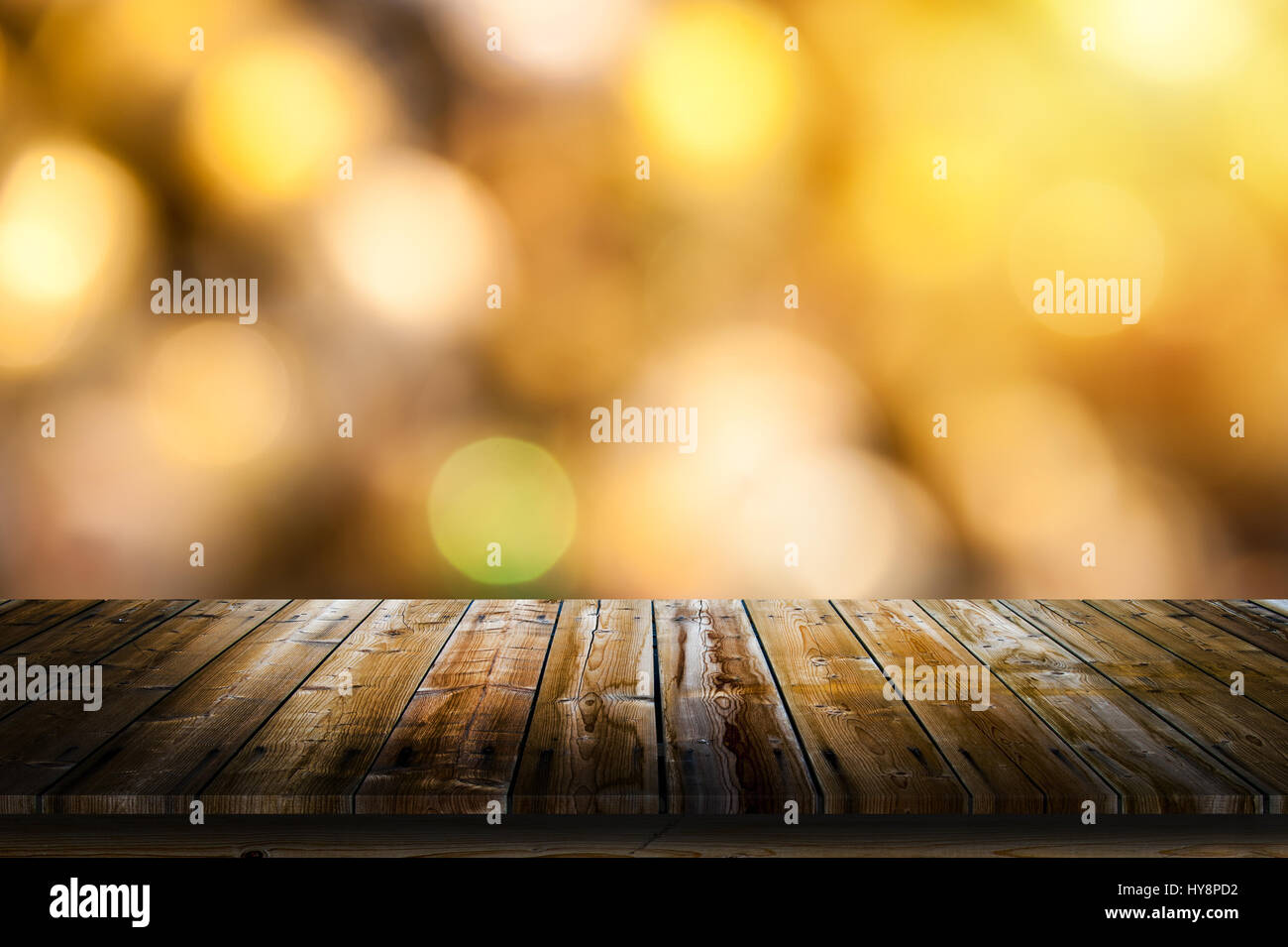 Golden bokeh background created by neon lights with table Stock Photo ...
