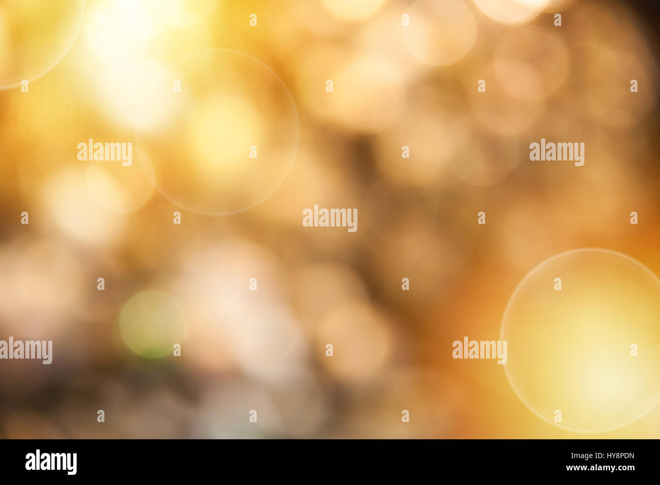 Golden bokeh background created by neon lights Stock Photo - Alamy