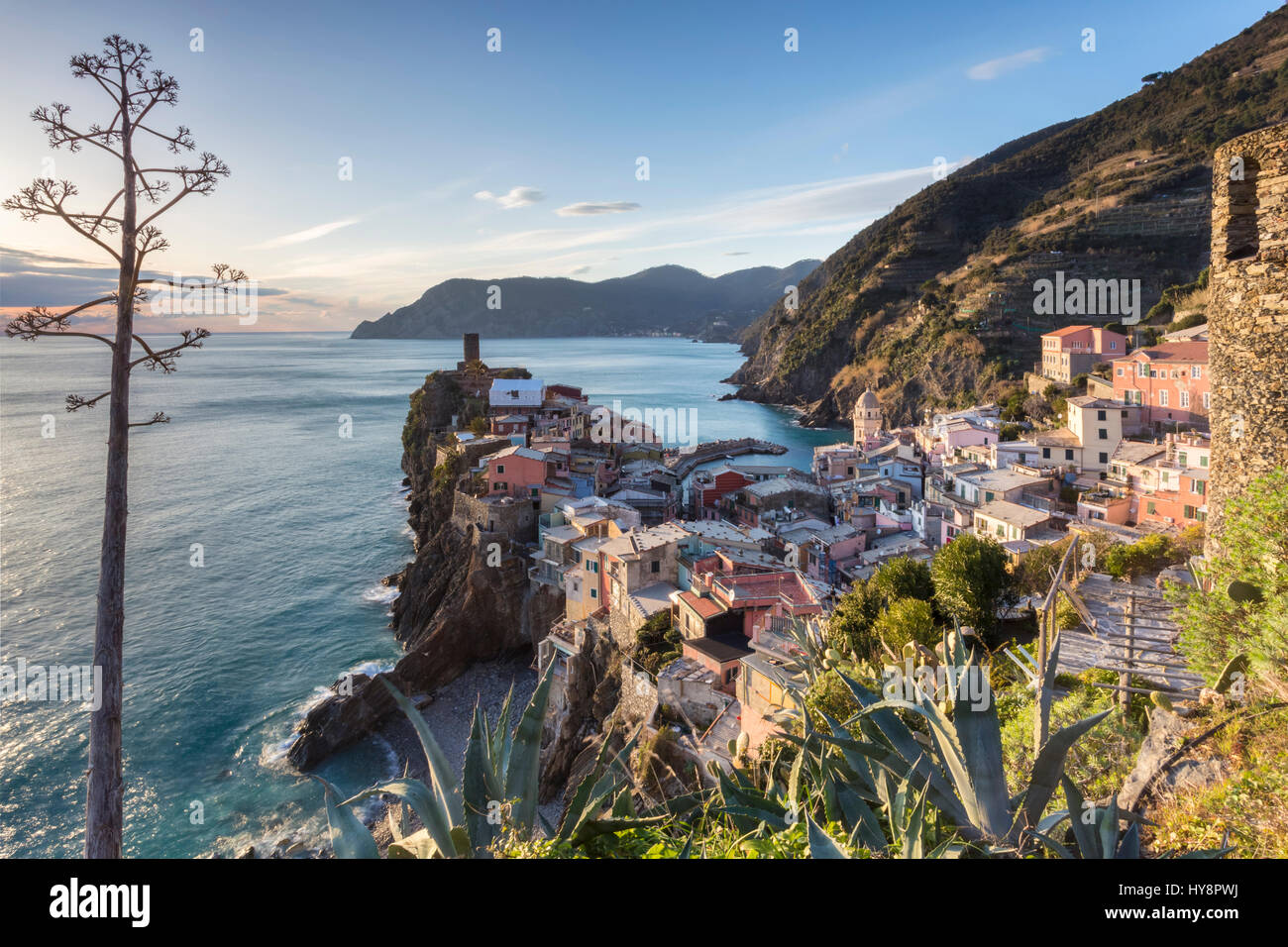 Sunset in the harbour of the village of Vernazza, Cinque Terre national park, province of La Spezia, Liguria, Italy. Stock Photo