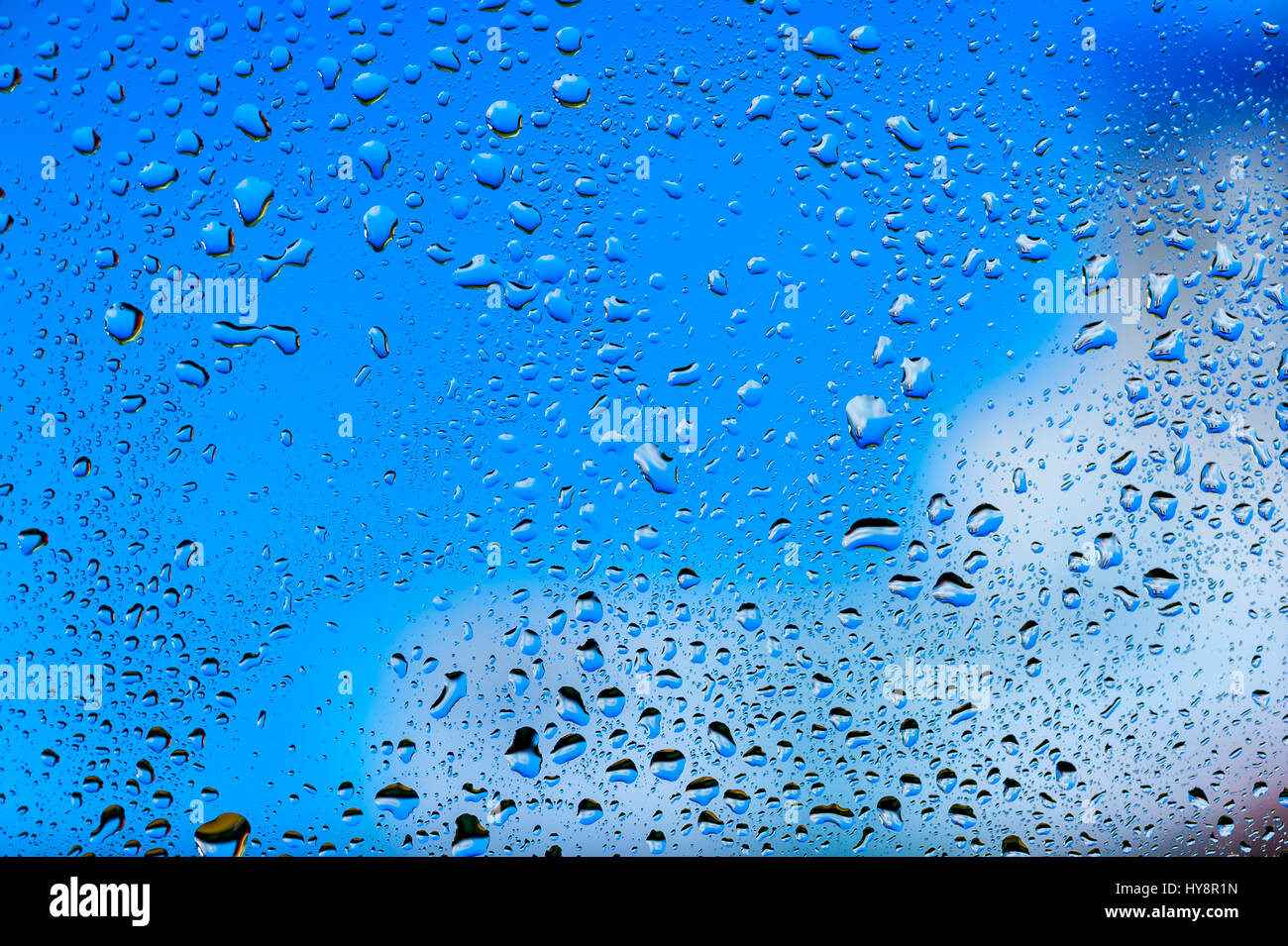 Abstract texture - Water drops on glass with blue background Stock ...