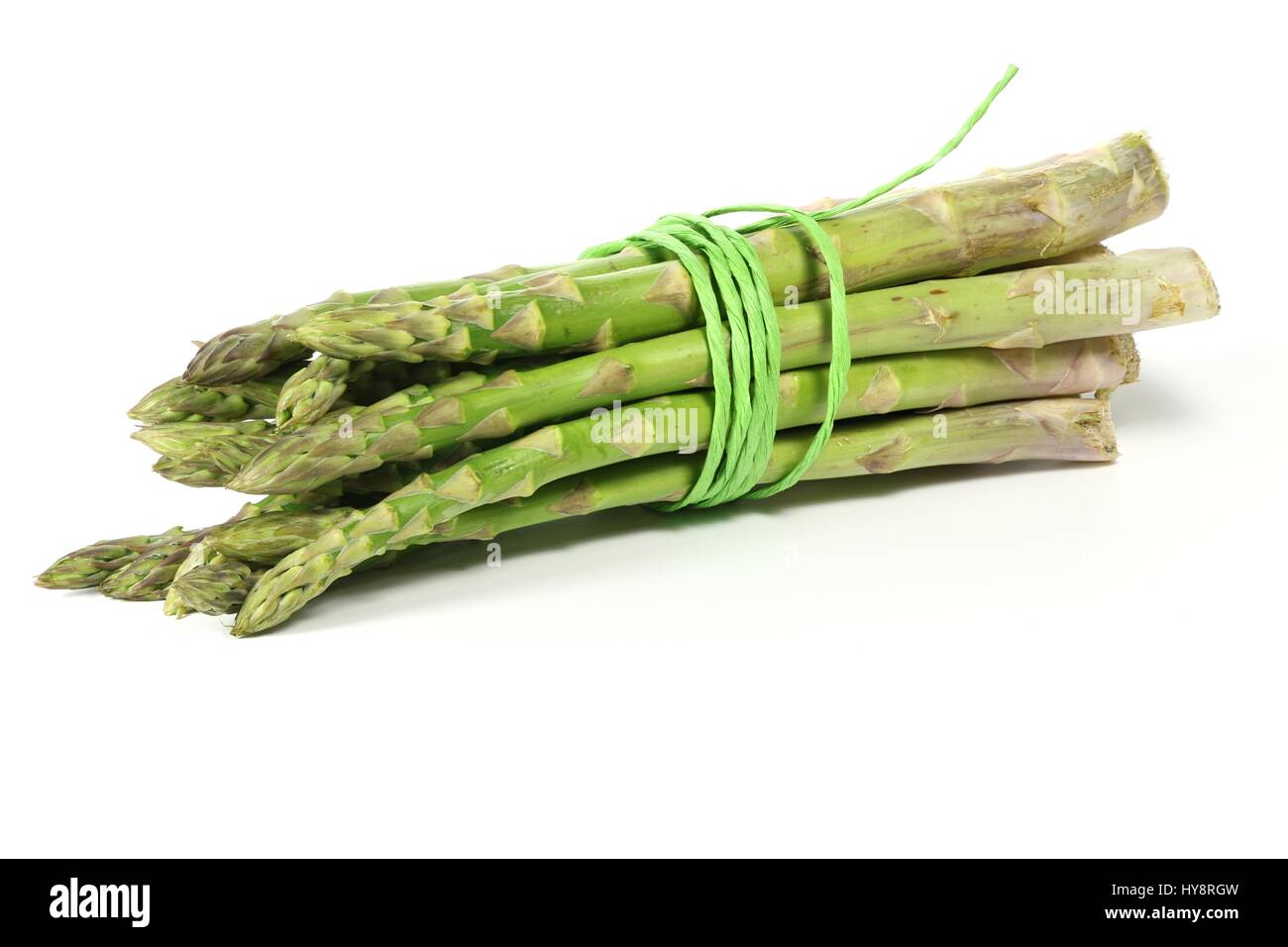 bundle of green asparagus isolated on white background Stock Photo