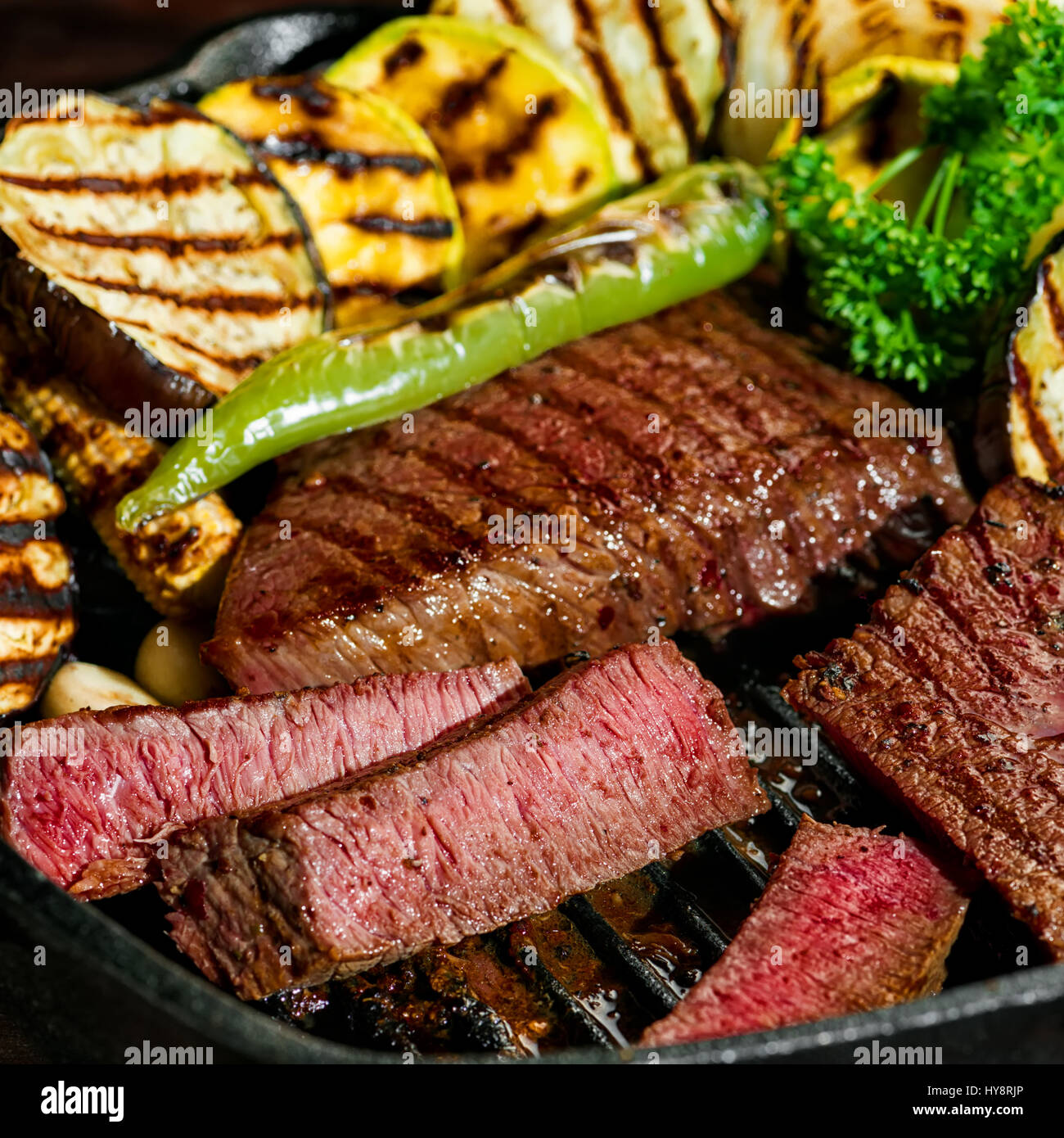 slicing delicious roasted meat with vegetable, healthy eating Stock Photo
