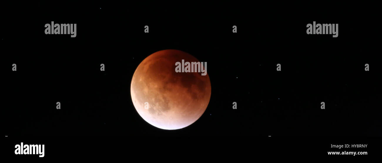 Panoramic image of Lunar Eclipse of Blood-moon Stock Photo - Alamy