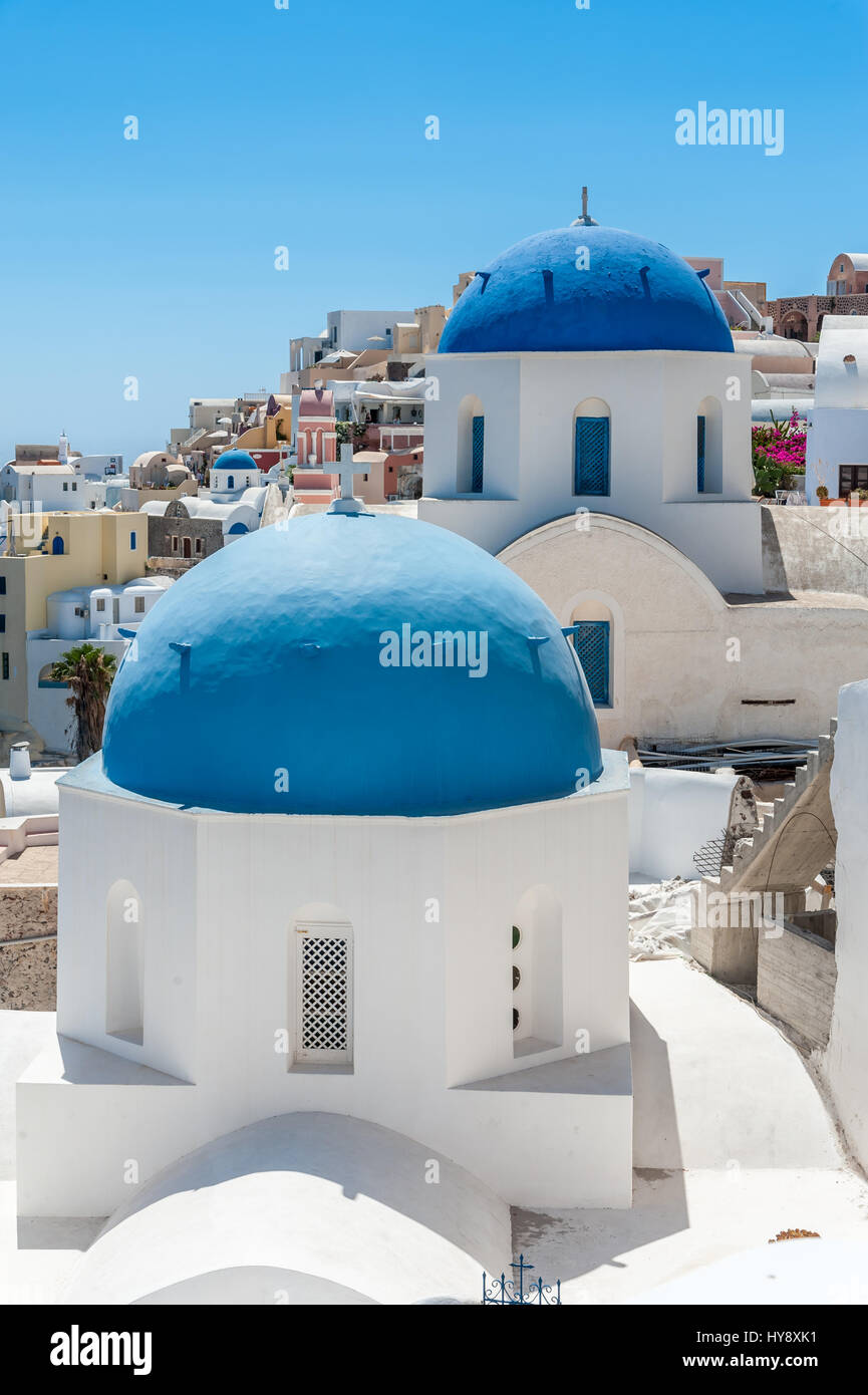 White and blue view of Santorini with two domes - Greece Stock Photo