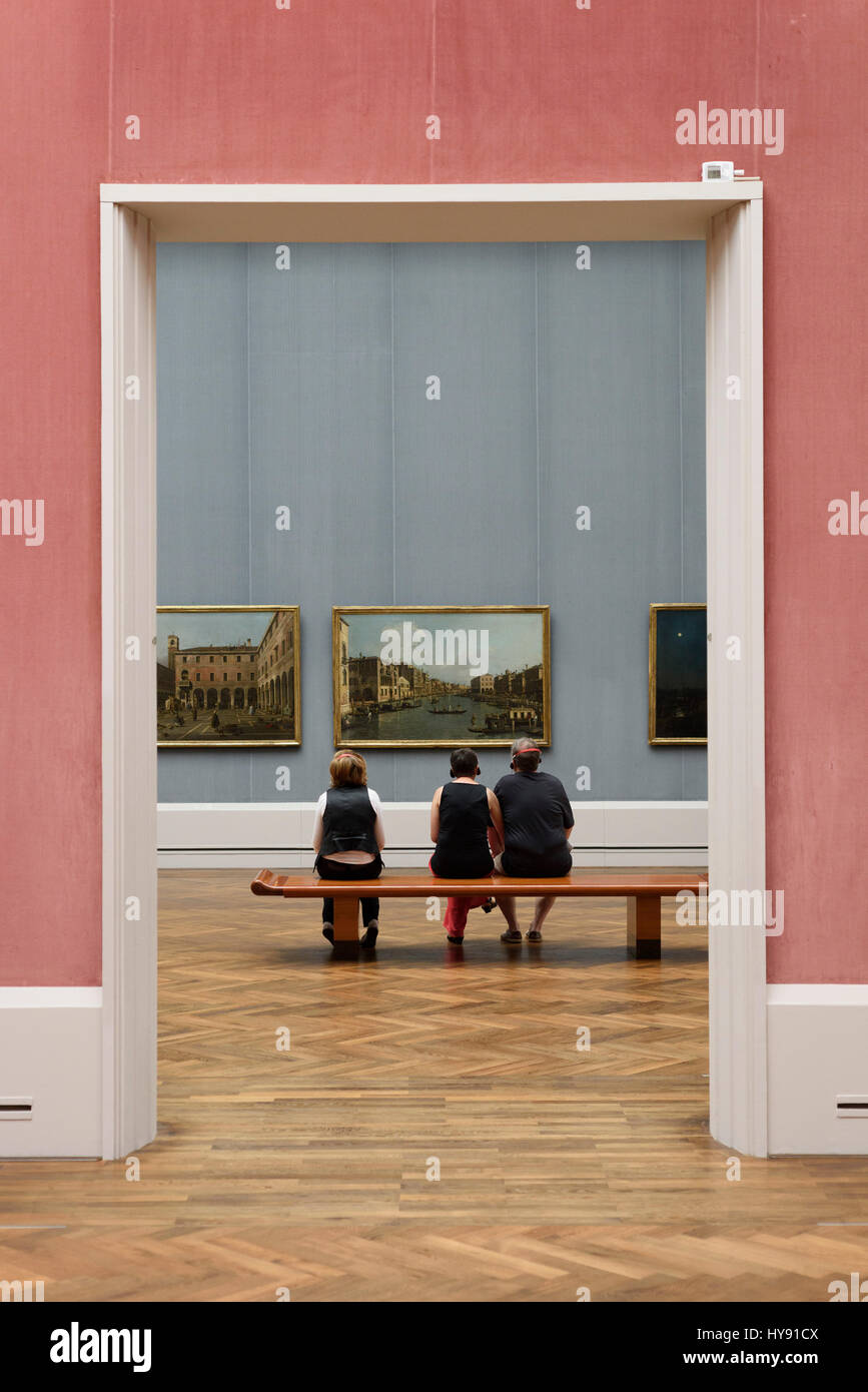 Berlin. Germany. Vistors looking at artwork in the Gemäldegalerie. Stock Photo