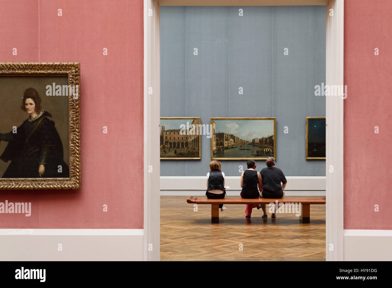 Berlin. Germany. Vistors looking at artwork in the Gemäldegalerie. Stock Photo