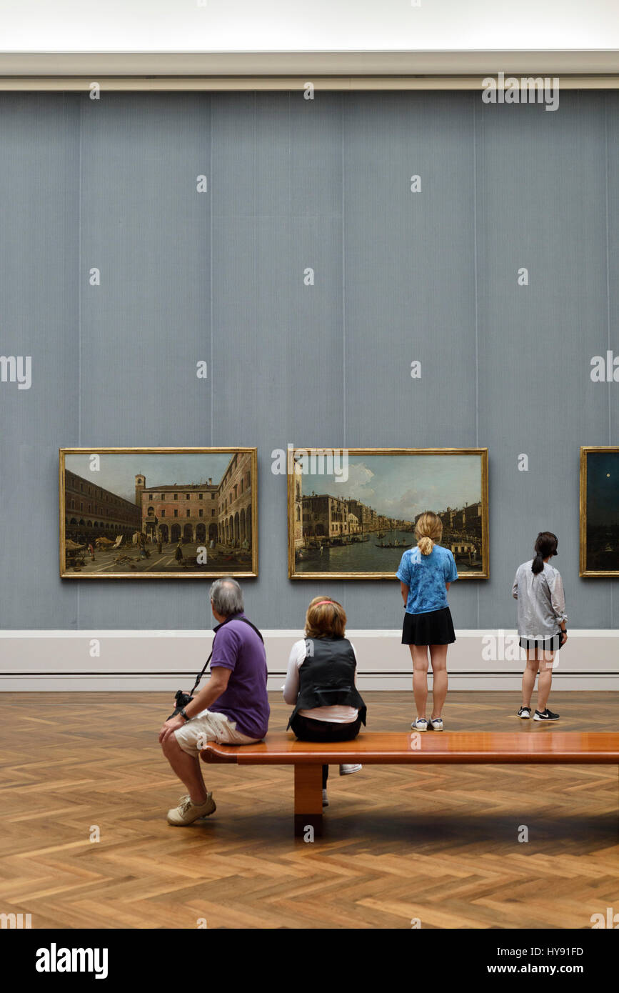 Berlin. Germany. Vistors looking at artwork in the Gemäldegalerie. Stock Photo