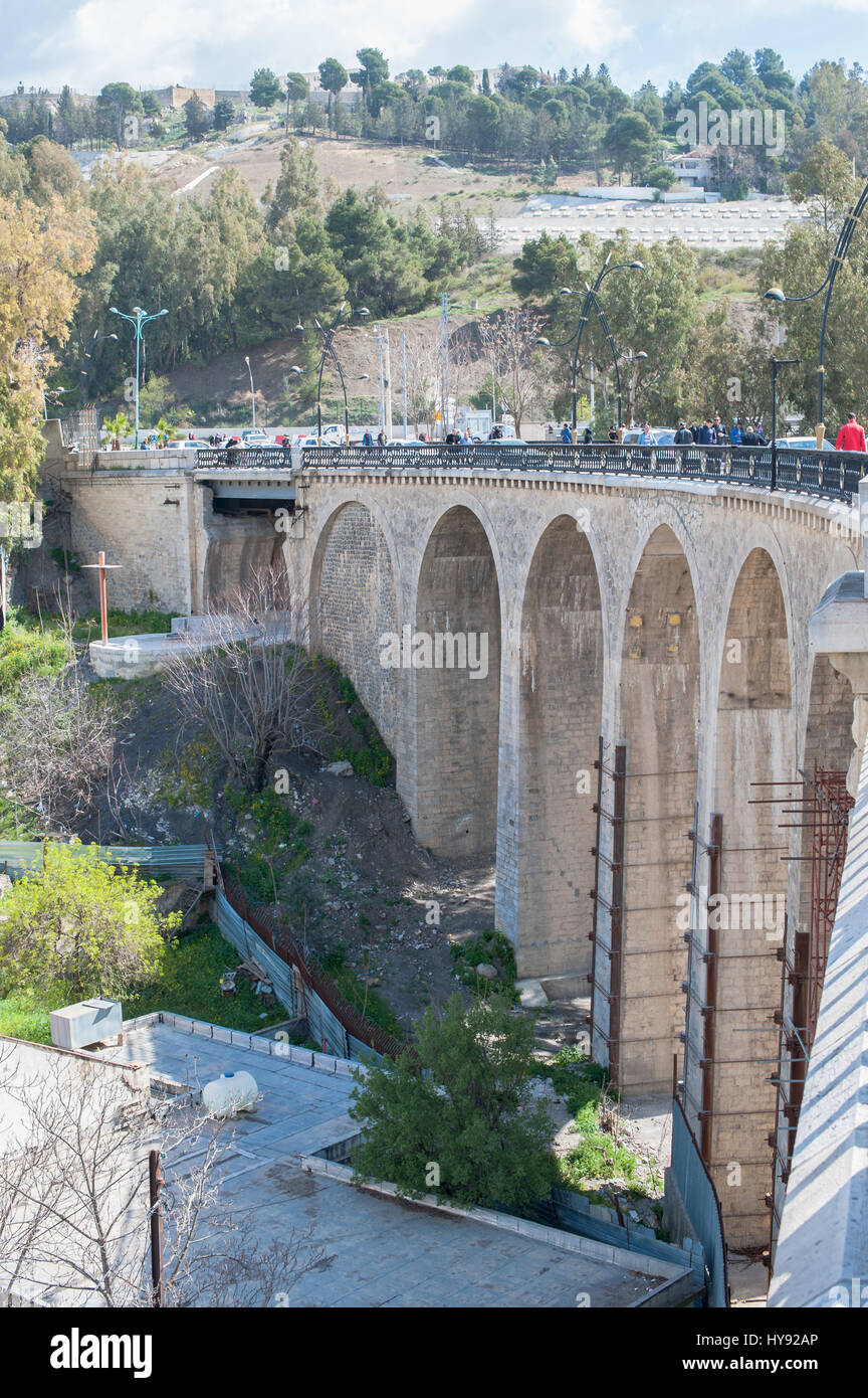 CONSTANTINE, ALGERIA - MARCH 07, 2017: Sidi Rasheed Bridge part of the Rhumel siting high on the rocks with a view of the old city.These bridges exist Stock Photo