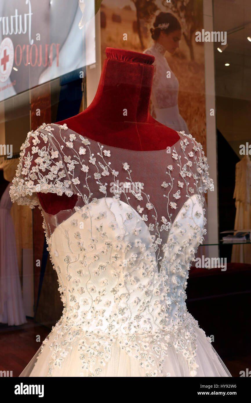 Wedding, white bridal gown dress on dummy mannequin on display in a window of a bridal fashion store shop, Italian style elegance. Rome, Italy, Europe Stock Photo