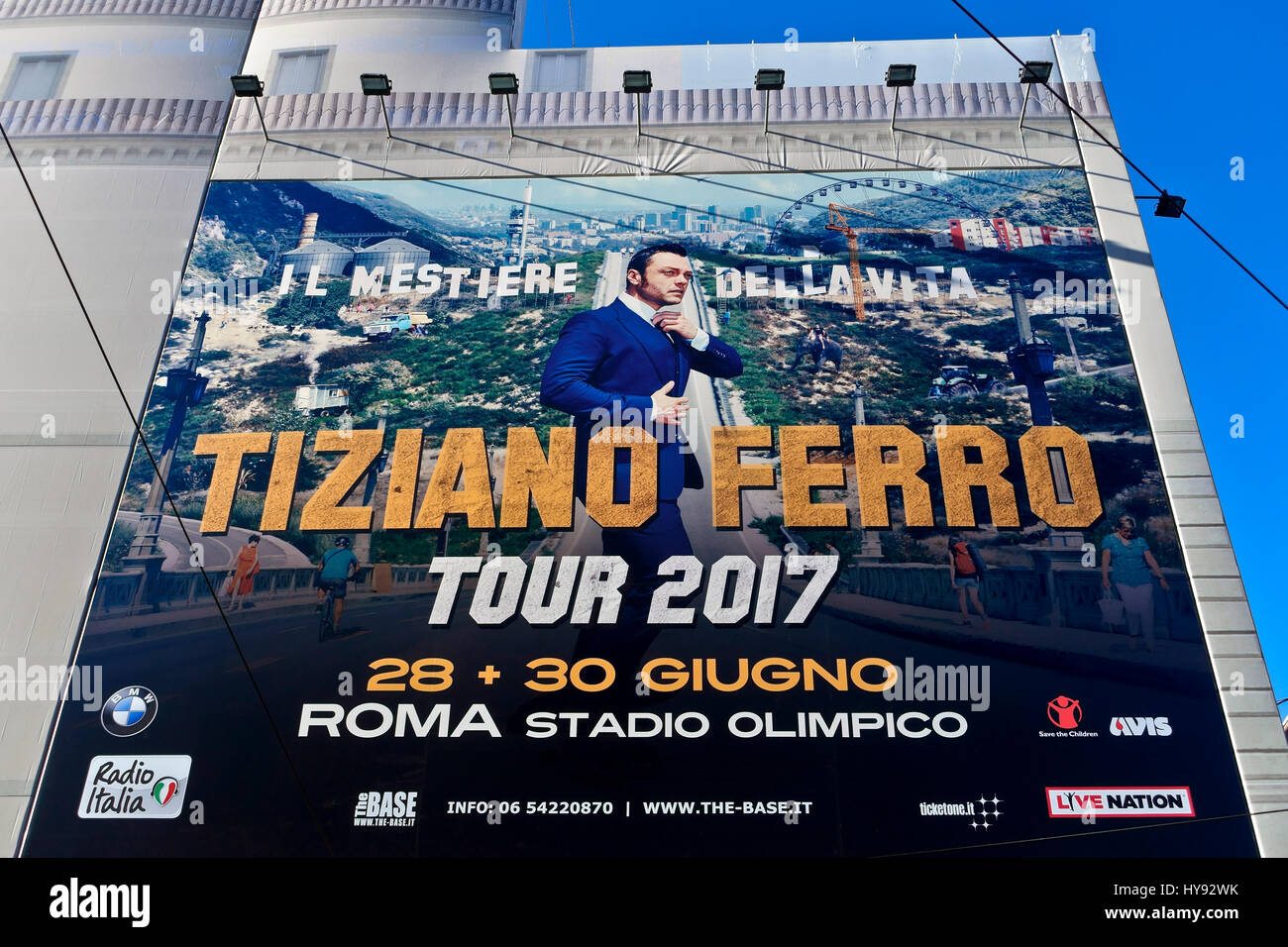 Tiziano Ferro italian singer. “Il mestiere della vita” tour 2017, 28 30 june at Rome Stadium. Huge concert poster on a building facade in Rome, Italy. Stock Photo