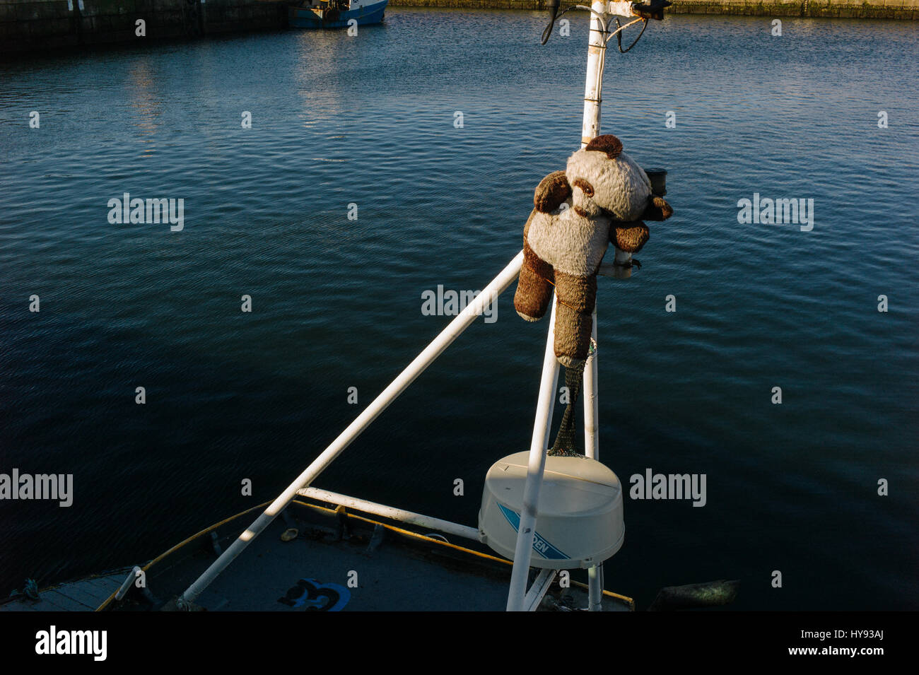 Mascot fastened to mast on Scottish Fishing Trawler in Buckie Harbour. Stock Photo
