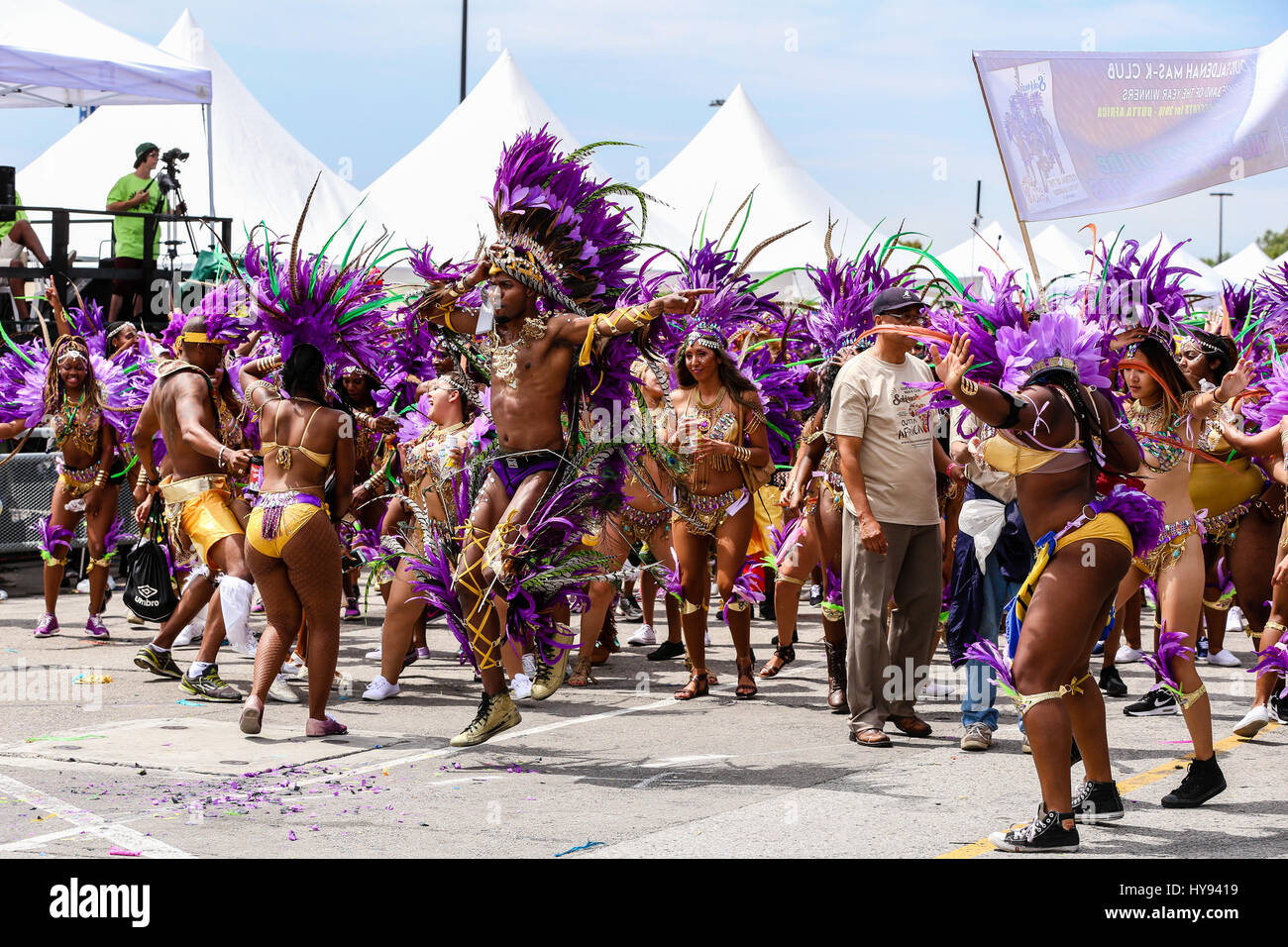 TORONTO, CANADA - JULY 20, 2016: Marchers in costume at The Toronto Caribbean Carnival, formerly called Caribana, a festival of Caribbean Stock Photo