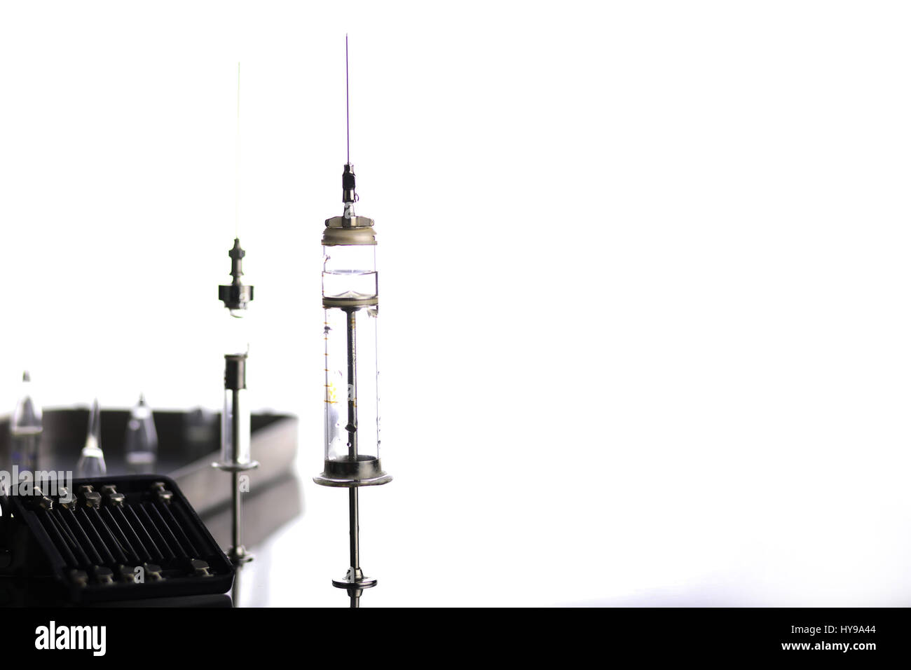 Old metal medical syringe and accessories on the table Stock Photo Alamy