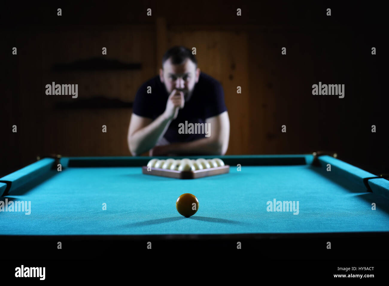 hansome man playing billiards alone Stock Photo Alamy