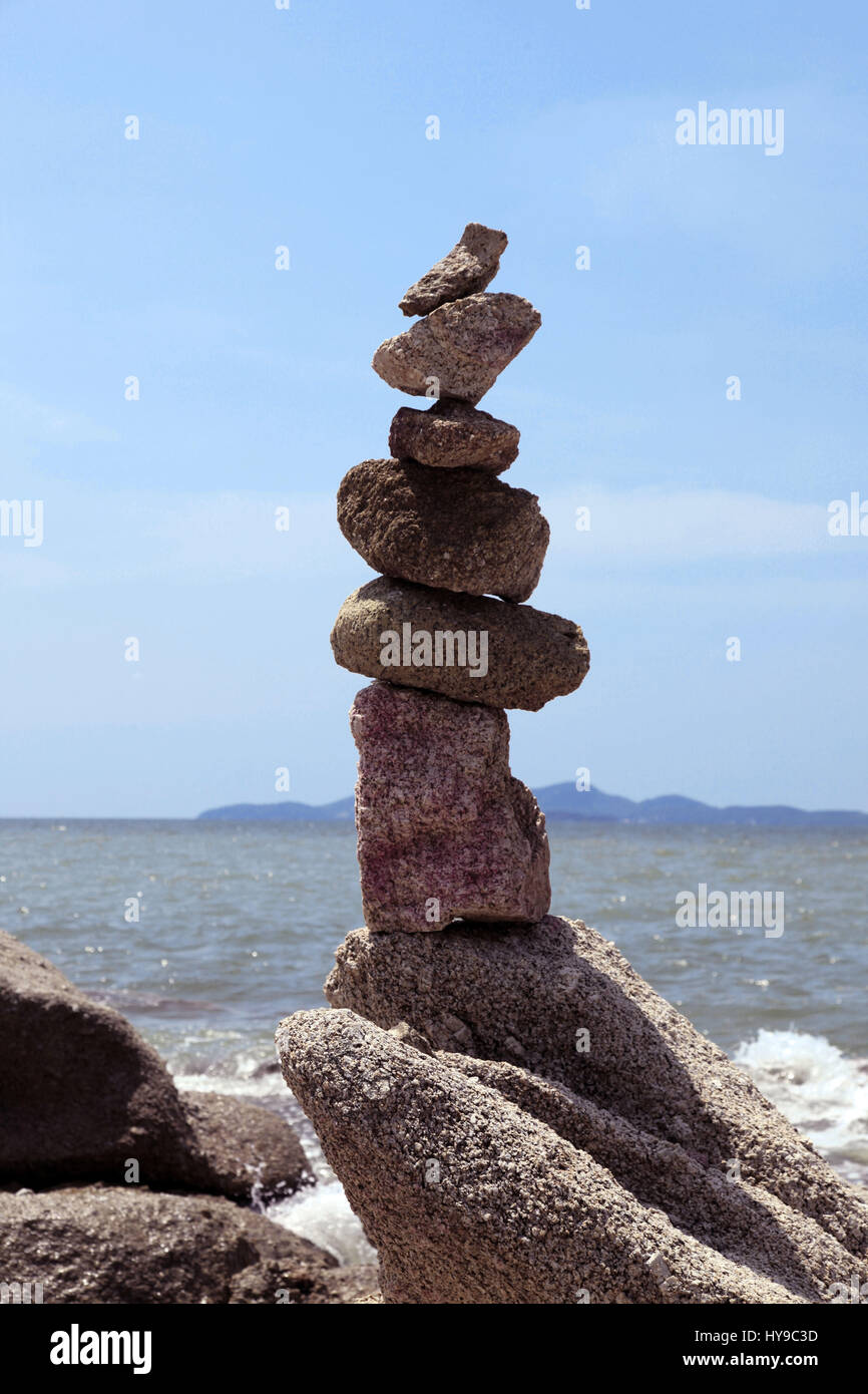Balanced Stones in Thailand Beach Stock Photo