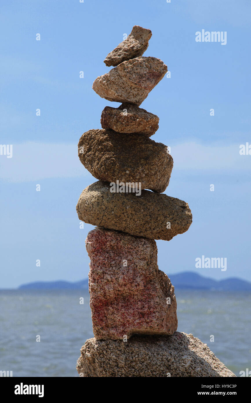 Balanced Stones in Thailand Beach Stock Photo
