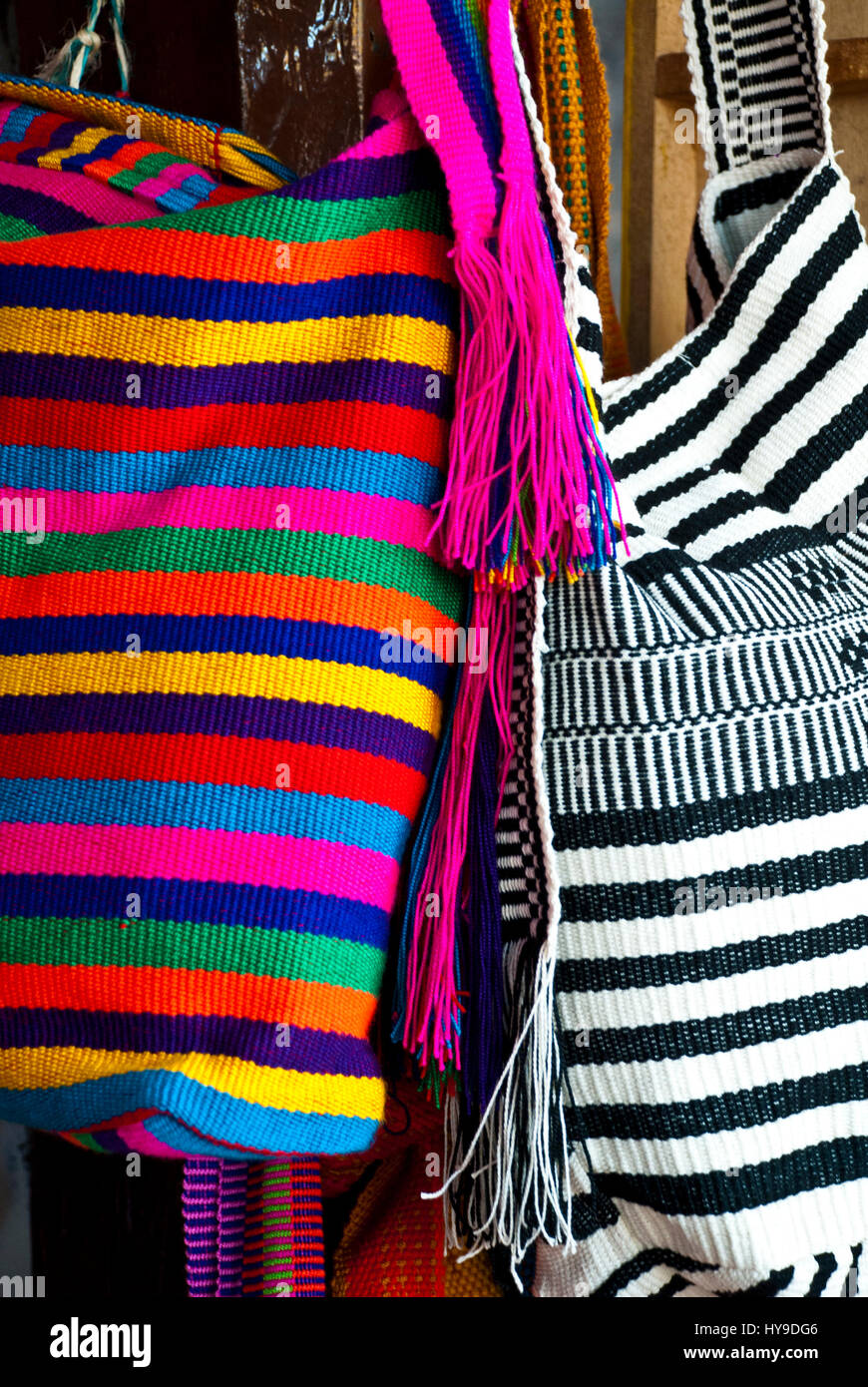 Women fashion accessories Various items of crocheted bucket style handbags Wayuu handcrafted mochilas woolen bags Colombia street market Stock Photo Alamy